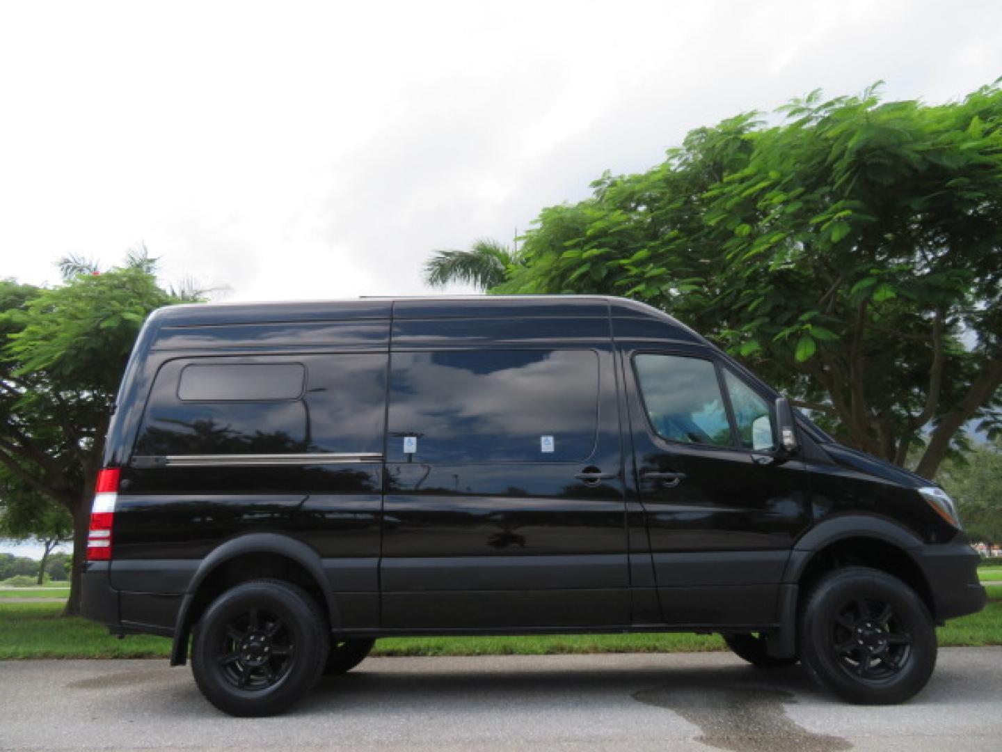 2017 Mercedes-Benz Sprinter 2500 Passenger Van 144-in. WB (WD4FE7CD2HP) with an 3.0L V6 DOHC 24V TURBO DIESEL engine, 7A transmission, located at 4301 Oak Circle #19, Boca Raton, FL, 33431, (954) 561-2499, 26.388861, -80.084038 - You are looking at a Gorgeous 2017 Mercedes Sprinter 2500 Diesel 4x4 High Roof Handicap Wheelchair Conversion Van with: Tourig Adventure Van Conversion, 16K Original Miles, Power Side Entry Braunability Millennium Series Wheelchair Lift, Remote Control Power Sliding Door, Q Straint Tie Downs in the - Photo#4