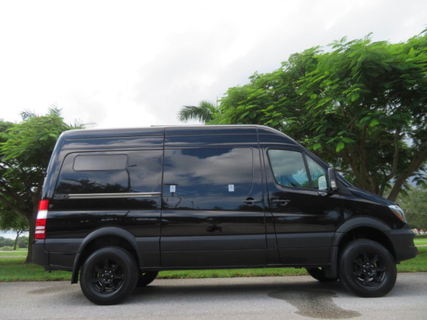 2017 Mercedes-Benz Sprinter 2500 Passenger Van 144-in. WB (WD4FE7CD2HP) with an 3.0L V6 DOHC 24V TURBO DIESEL engine, 7A transmission, located at 4301 Oak Circle #19, Boca Raton, FL, 33431, (954) 561-2499, 26.388861, -80.084038 - You are looking at a Gorgeous 2017 Mercedes Sprinter 2500 Diesel 4x4 High Roof Handicap Wheelchair Conversion Van with: Tourig Adventure Van Conversion, 16K Original Miles, Power Side Entry Braunability Millennium Series Wheelchair Lift, Remote Control Power Sliding Door, Q Straint Tie Downs in the - Photo#5