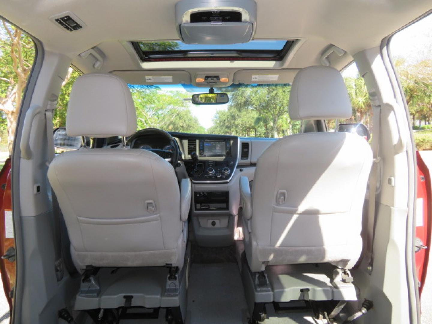 2017 Toyota Sienna Limited Premium 7-Passenger (5TDYZ3DC6HS) with an 3.5L V6 EFI DOHC 24V engine, 8A transmission, located at 4301 Oak Circle #19, Boca Raton, FL, 33431, (954) 561-2499, 26.388861, -80.084038 - You are looking at a Gorgeous 2017 Toyota Sienna XLE VMI Summit Handicap Wheelchair Conversion Van with Power Side Entry Foldout Ramp, Q-Straint Tie Down System with Retractors, Rear Entertainment Flat Screen TV, Back Up Camera, Quick Release Front Seats, Alloy Wheels, Dual Power Side Entry Doors, H - Photo#48