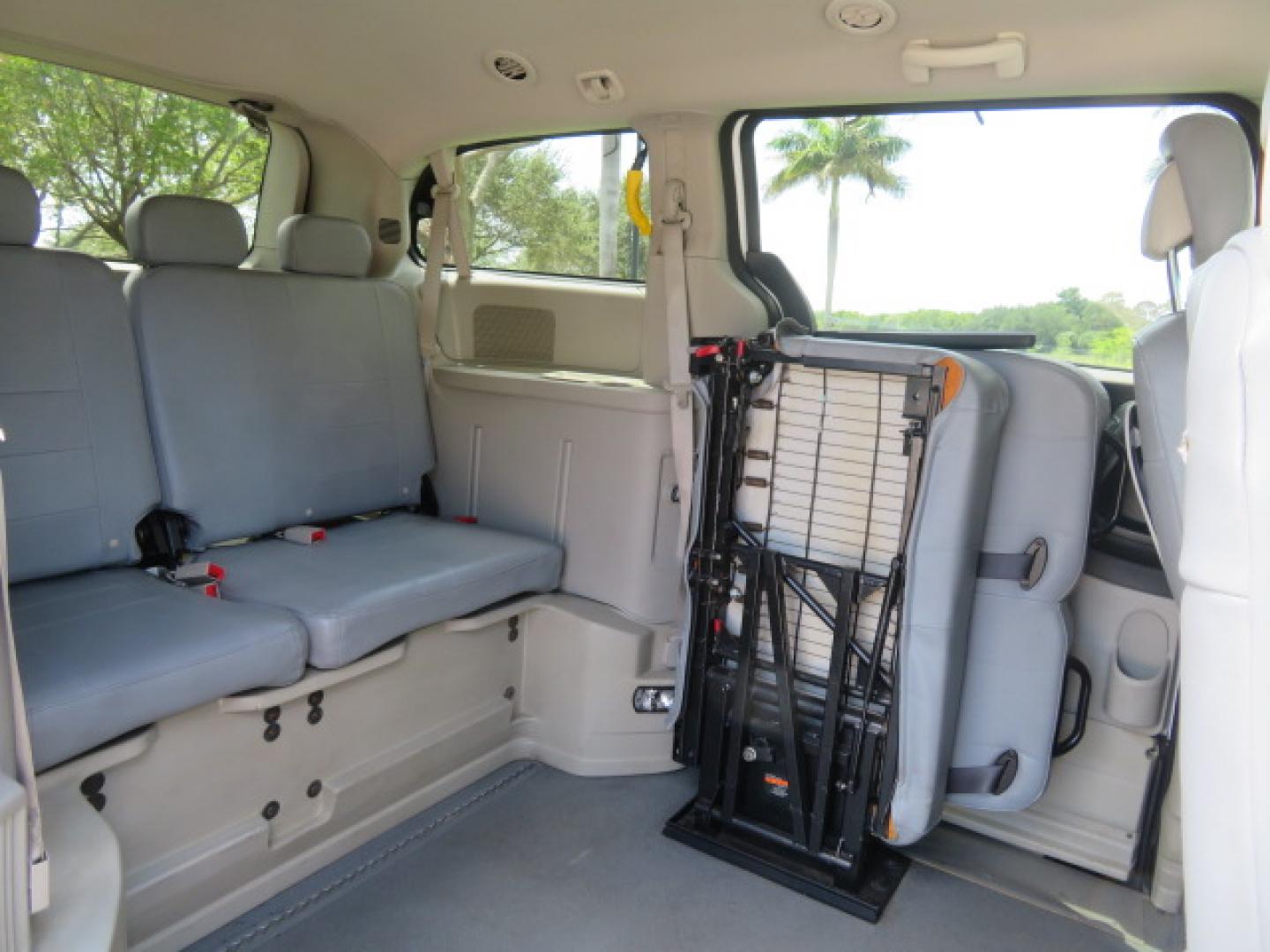 2014 White /Gray Dodge Grand Caravan SE (2C7WDGBG3ER) with an 3.6L V6 DOHC 24V engine, 6-Speed Automatic transmission, located at 4301 Oak Circle #19, Boca Raton, FL, 33431, (954) 561-2499, 26.388472, -80.084045 - You are looking a beautiful 2014 Dodge Grand Caravan SXT Braunability Handicap Wheelchair Conversion Van with 121K Original Miles, Braunability Commercial Handicap Van Conversion with Manual Side Entry Ramp, Wheelchair Tie Downs, Dual Sliding Doors, Power Package, Soundsystem, Cruise Control, and Mu - Photo#51