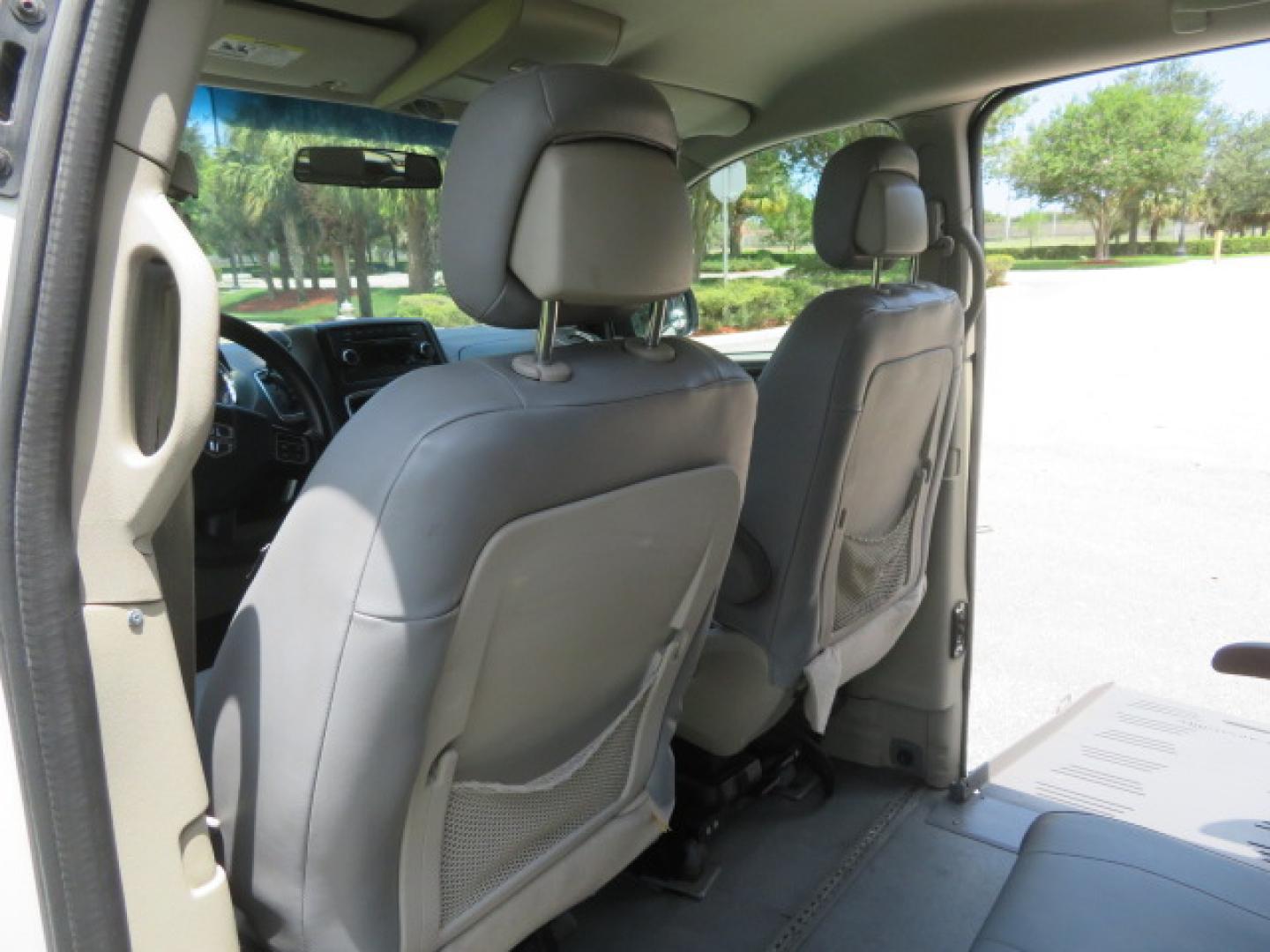 2014 White /Gray Dodge Grand Caravan SE (2C7WDGBG3ER) with an 3.6L V6 DOHC 24V engine, 6-Speed Automatic transmission, located at 4301 Oak Circle #19, Boca Raton, FL, 33431, (954) 561-2499, 26.388472, -80.084045 - You are looking a beautiful 2014 Dodge Grand Caravan SXT Braunability Handicap Wheelchair Conversion Van with 121K Original Miles, Braunability Commercial Handicap Van Conversion with Manual Side Entry Ramp, Wheelchair Tie Downs, Dual Sliding Doors, Power Package, Soundsystem, Cruise Control, and Mu - Photo#57