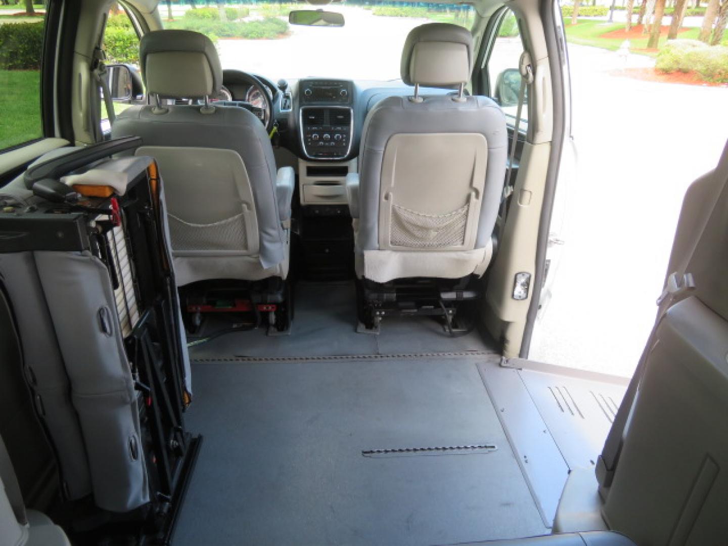 2014 White /Gray Dodge Grand Caravan SE (2C7WDGBG3ER) with an 3.6L V6 DOHC 24V engine, 6-Speed Automatic transmission, located at 4301 Oak Circle #19, Boca Raton, FL, 33431, (954) 561-2499, 26.388472, -80.084045 - You are looking a beautiful 2014 Dodge Grand Caravan SXT Braunability Handicap Wheelchair Conversion Van with 121K Original Miles, Braunability Commercial Handicap Van Conversion with Manual Side Entry Ramp, Wheelchair Tie Downs, Dual Sliding Doors, Power Package, Soundsystem, Cruise Control, and Mu - Photo#86