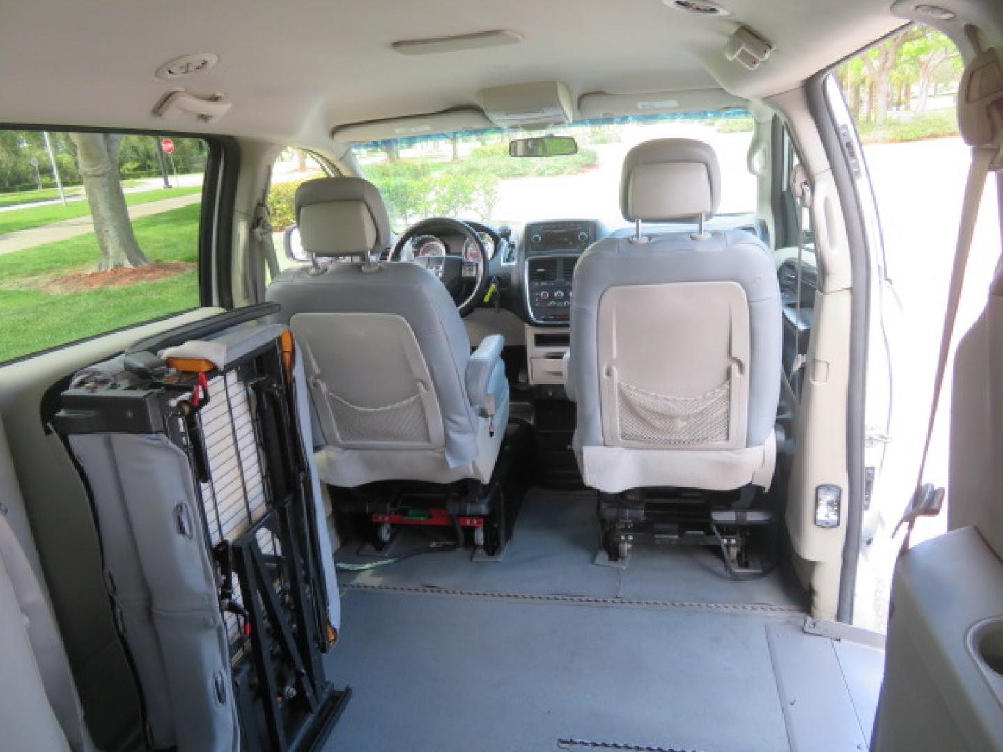 2014 White /Gray Dodge Grand Caravan SE (2C7WDGBG3ER) with an 3.6L V6 DOHC 24V engine, 6-Speed Automatic transmission, located at 4301 Oak Circle #19, Boca Raton, FL, 33431, (954) 561-2499, 26.388472, -80.084045 - You are looking a beautiful 2014 Dodge Grand Caravan SXT Braunability Handicap Wheelchair Conversion Van with 121K Original Miles, Braunability Commercial Handicap Van Conversion with Manual Side Entry Ramp, Wheelchair Tie Downs, Dual Sliding Doors, Power Package, Soundsystem, Cruise Control, and Mu - Photo#87