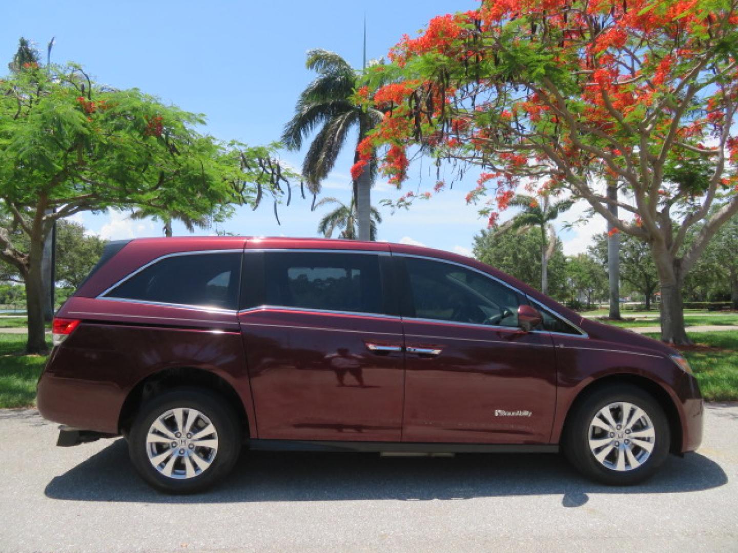 2016 Red /Beige Honda Odyssey EX-L (5FNRL5H62GB) with an 3.5L V6 SOHC 24V engine, 6A transmission, located at 4301 Oak Circle #19, Boca Raton, FL, 33431, (954) 561-2499, 26.388472, -80.084045 - 2016 Honda Odyssey EXL with Navigation with 29K Original Miles Braunability Handicap Wheelchair Conversion Van Rear Entry Conversion. Gorgeous Low Mileage Florida Van Fully Loaded With Every Option Including: Remote Keyless Entry, Push Button Start, Beautiful Beige Leather Interior, Tech Package, Na - Photo#10