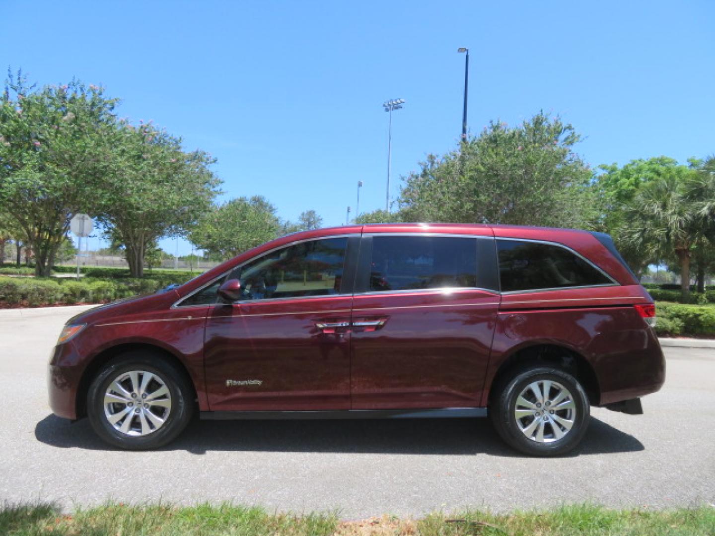 2016 Red /Beige Honda Odyssey EX-L (5FNRL5H62GB) with an 3.5L V6 SOHC 24V engine, 6A transmission, located at 4301 Oak Circle #19, Boca Raton, FL, 33431, (954) 561-2499, 26.388472, -80.084045 - 2016 Honda Odyssey EXL with Navigation with 29K Original Miles Braunability Handicap Wheelchair Conversion Van Rear Entry Conversion. Gorgeous Low Mileage Florida Van Fully Loaded With Every Option Including: Remote Keyless Entry, Push Button Start, Beautiful Beige Leather Interior, Tech Package, Na - Photo#19