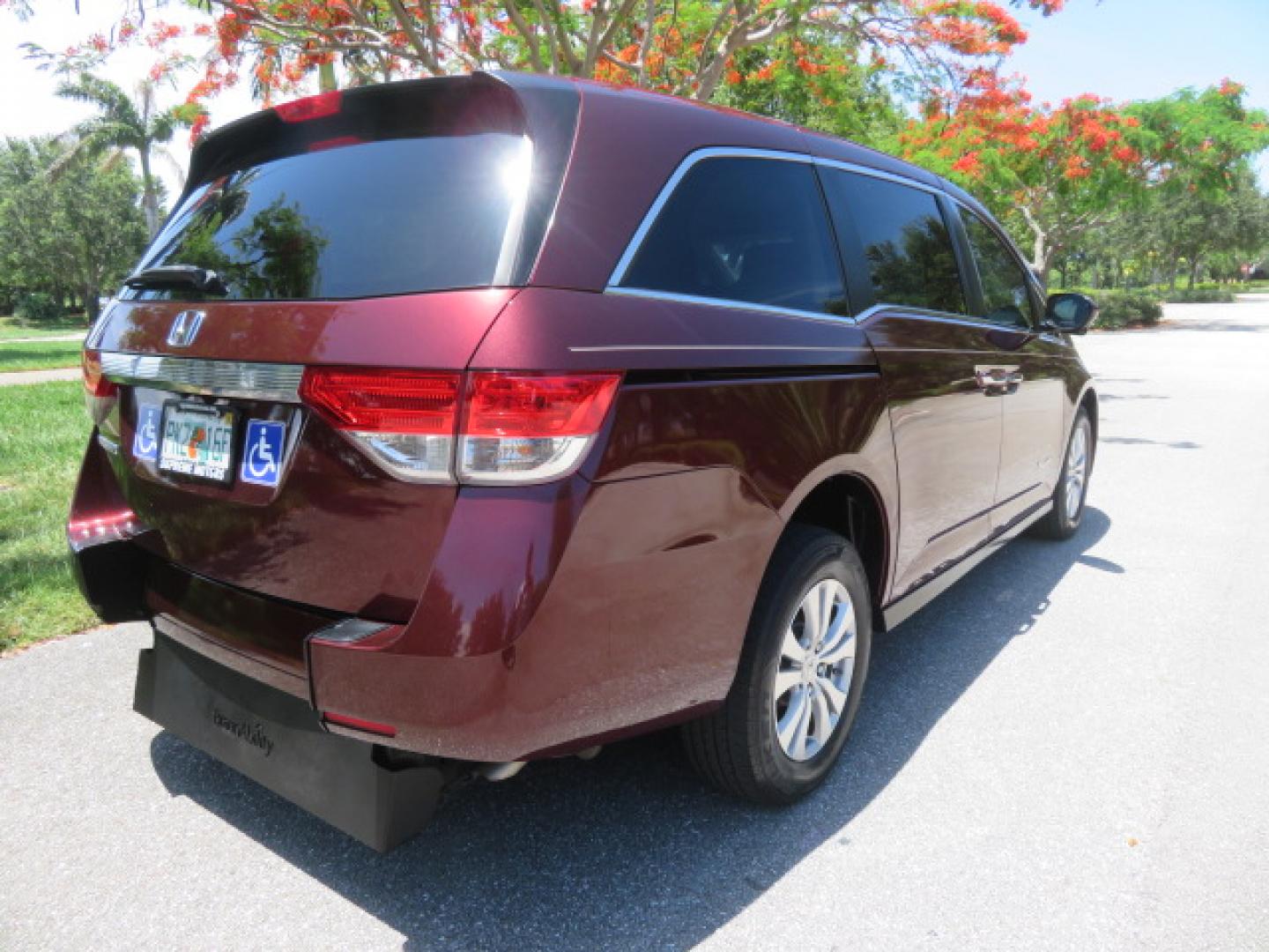 2016 Red /Beige Honda Odyssey EX-L (5FNRL5H62GB) with an 3.5L V6 SOHC 24V engine, 6A transmission, located at 4301 Oak Circle #19, Boca Raton, FL, 33431, (954) 561-2499, 26.388472, -80.084045 - 2016 Honda Odyssey EXL with Navigation with 29K Original Miles Braunability Handicap Wheelchair Conversion Van Rear Entry Conversion. Gorgeous Low Mileage Florida Van Fully Loaded With Every Option Including: Remote Keyless Entry, Push Button Start, Beautiful Beige Leather Interior, Tech Package, Na - Photo#23
