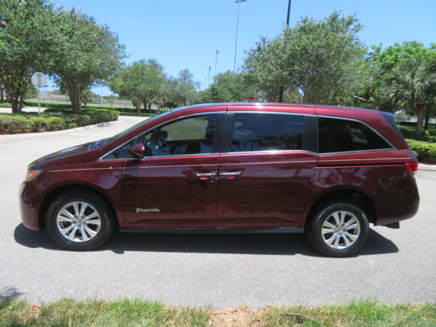 2016 Red /Beige Honda Odyssey EX-L (5FNRL5H62GB) with an 3.5L V6 SOHC 24V engine, 6A transmission, located at 4301 Oak Circle #19, Boca Raton, FL, 33431, (954) 561-2499, 26.388472, -80.084045 - 2016 Honda Odyssey EXL with Navigation with 29K Original Miles Braunability Handicap Wheelchair Conversion Van Rear Entry Conversion. Gorgeous Low Mileage Florida Van Fully Loaded With Every Option Including: Remote Keyless Entry, Push Button Start, Beautiful Beige Leather Interior, Tech Package, Na - Photo#28
