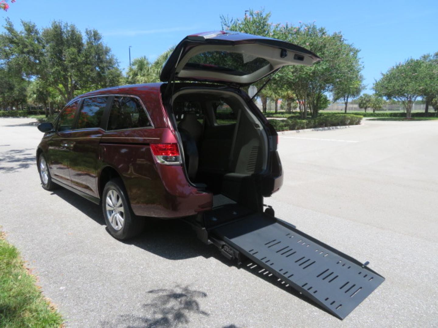 2016 Red /Beige Honda Odyssey EX-L (5FNRL5H62GB) with an 3.5L V6 SOHC 24V engine, 6A transmission, located at 4301 Oak Circle #19, Boca Raton, FL, 33431, (954) 561-2499, 26.388472, -80.084045 - 2016 Honda Odyssey EXL with Navigation with 29K Original Miles Braunability Handicap Wheelchair Conversion Van Rear Entry Conversion. Gorgeous Low Mileage Florida Van Fully Loaded With Every Option Including: Remote Keyless Entry, Push Button Start, Beautiful Beige Leather Interior, Tech Package, Na - Photo#36