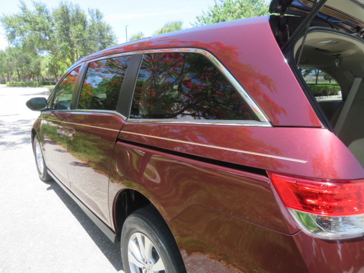 2016 Red /Beige Honda Odyssey EX-L (5FNRL5H62GB) with an 3.5L V6 SOHC 24V engine, 6A transmission, located at 4301 Oak Circle #19, Boca Raton, FL, 33431, (954) 561-2499, 26.388472, -80.084045 - 2016 Honda Odyssey EXL with Navigation with 29K Original Miles Braunability Handicap Wheelchair Conversion Van Rear Entry Conversion. Gorgeous Low Mileage Florida Van Fully Loaded With Every Option Including: Remote Keyless Entry, Push Button Start, Beautiful Beige Leather Interior, Tech Package, Na - Photo#44