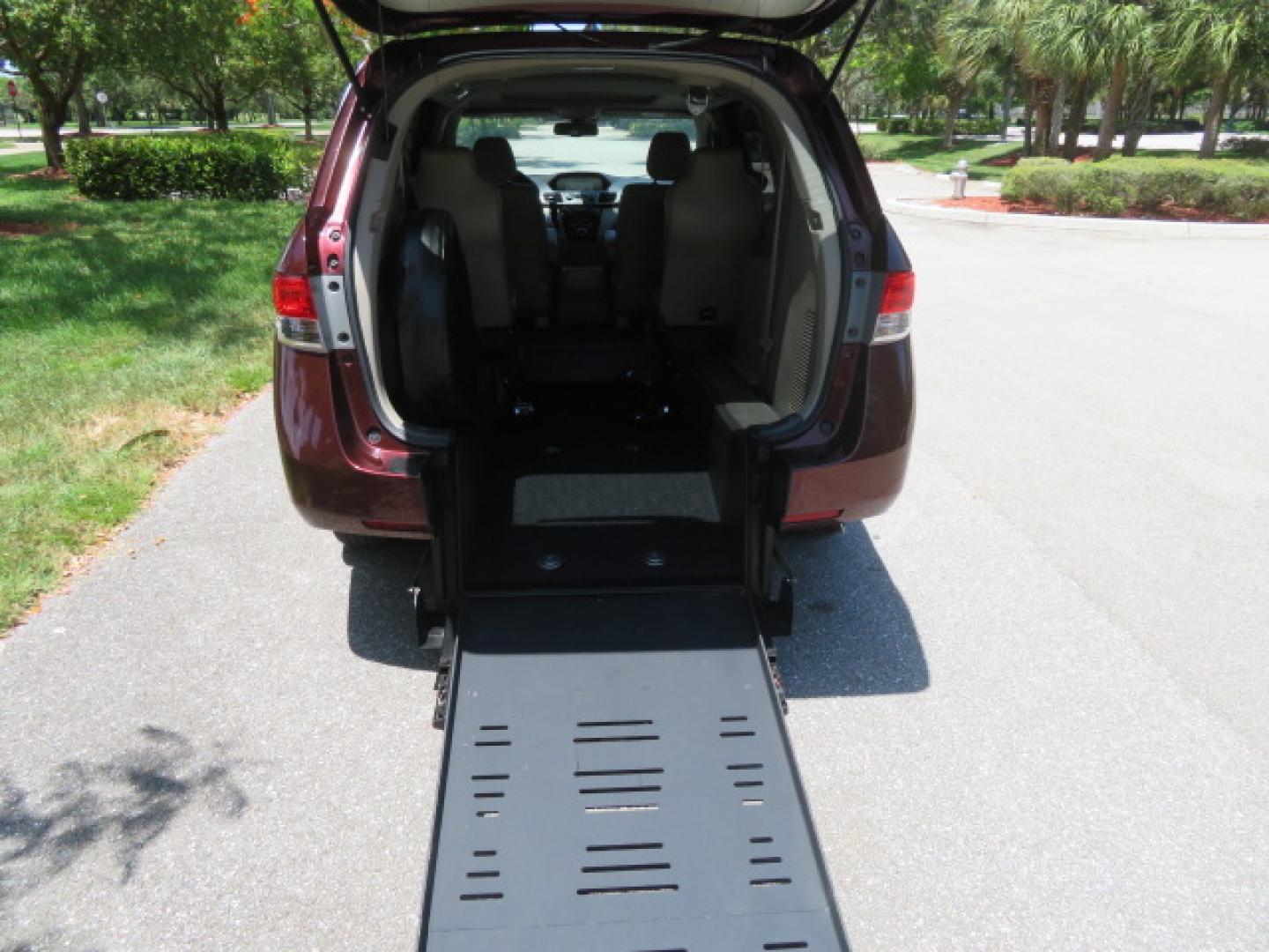 2016 Red /Beige Honda Odyssey EX-L (5FNRL5H62GB) with an 3.5L V6 SOHC 24V engine, 6A transmission, located at 4301 Oak Circle #19, Boca Raton, FL, 33431, (954) 561-2499, 26.388472, -80.084045 - 2016 Honda Odyssey EXL with Navigation with 29K Original Miles Braunability Handicap Wheelchair Conversion Van Rear Entry Conversion. Gorgeous Low Mileage Florida Van Fully Loaded With Every Option Including: Remote Keyless Entry, Push Button Start, Beautiful Beige Leather Interior, Tech Package, Na - Photo#50