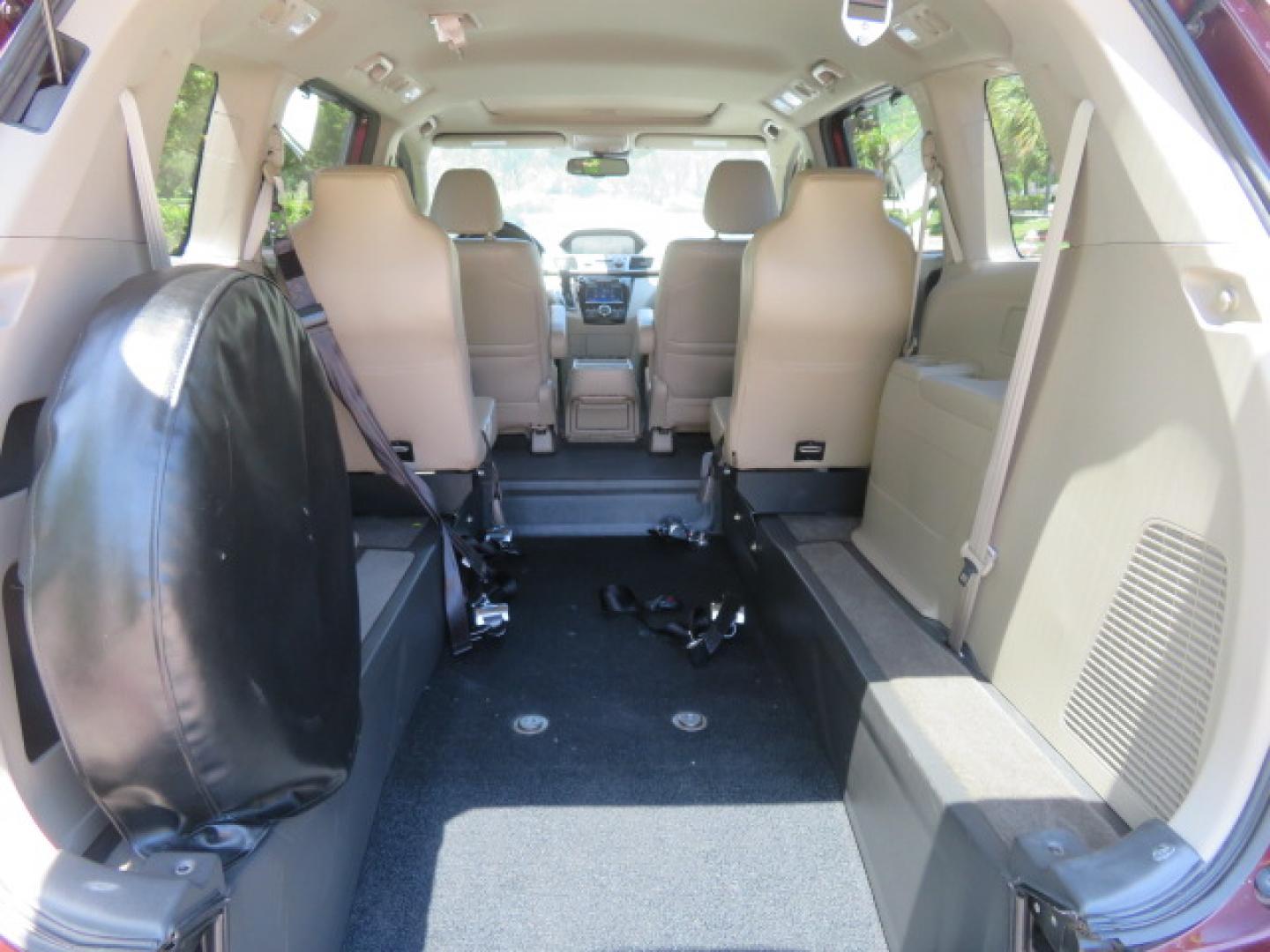 2016 Red /Beige Honda Odyssey EX-L (5FNRL5H62GB) with an 3.5L V6 SOHC 24V engine, 6A transmission, located at 4301 Oak Circle #19, Boca Raton, FL, 33431, (954) 561-2499, 26.388472, -80.084045 - 2016 Honda Odyssey EXL with Navigation with 29K Original Miles Braunability Handicap Wheelchair Conversion Van Rear Entry Conversion. Gorgeous Low Mileage Florida Van Fully Loaded With Every Option Including: Remote Keyless Entry, Push Button Start, Beautiful Beige Leather Interior, Tech Package, Na - Photo#51