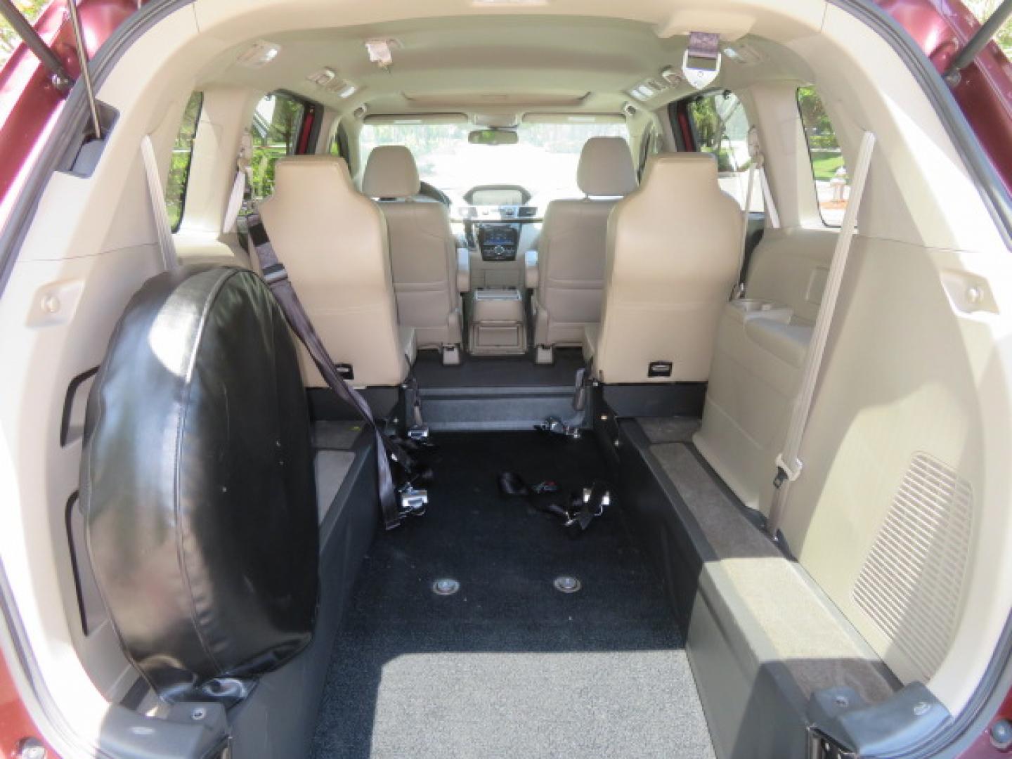 2016 Red /Beige Honda Odyssey EX-L (5FNRL5H62GB) with an 3.5L V6 SOHC 24V engine, 6A transmission, located at 4301 Oak Circle #19, Boca Raton, FL, 33431, (954) 561-2499, 26.388472, -80.084045 - 2016 Honda Odyssey EXL with Navigation with 29K Original Miles Braunability Handicap Wheelchair Conversion Van Rear Entry Conversion. Gorgeous Low Mileage Florida Van Fully Loaded With Every Option Including: Remote Keyless Entry, Push Button Start, Beautiful Beige Leather Interior, Tech Package, Na - Photo#6
