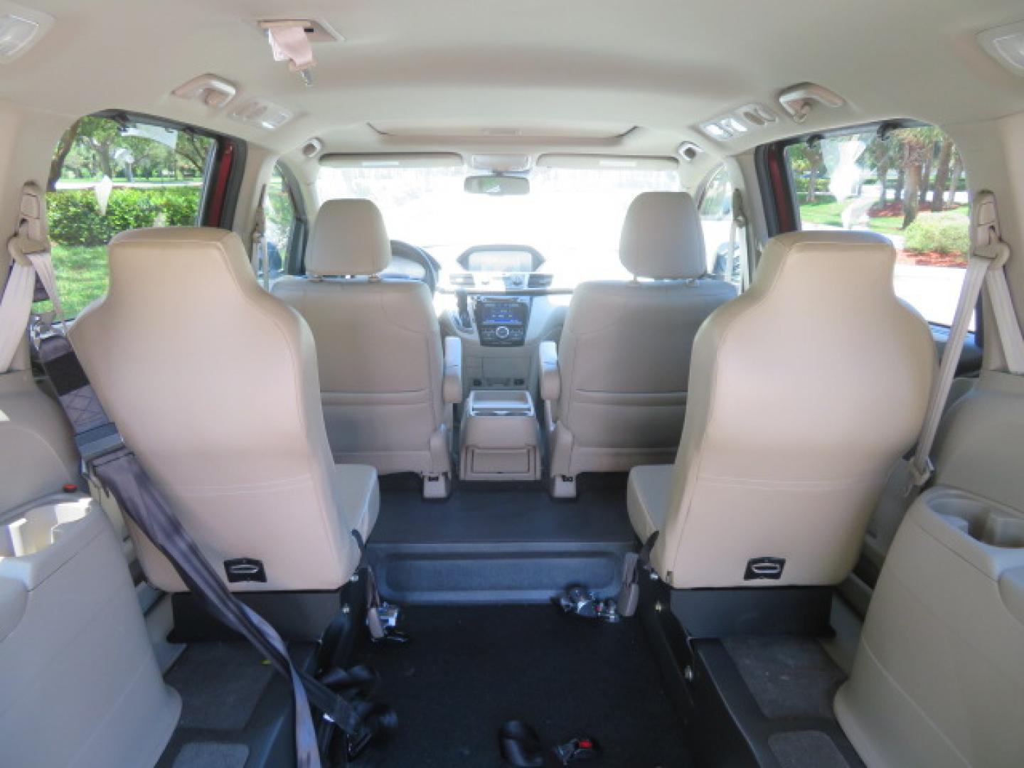 2016 Red /Beige Honda Odyssey EX-L (5FNRL5H62GB) with an 3.5L V6 SOHC 24V engine, 6A transmission, located at 4301 Oak Circle #19, Boca Raton, FL, 33431, (954) 561-2499, 26.388472, -80.084045 - 2016 Honda Odyssey EXL with Navigation with 29K Original Miles Braunability Handicap Wheelchair Conversion Van Rear Entry Conversion. Gorgeous Low Mileage Florida Van Fully Loaded With Every Option Including: Remote Keyless Entry, Push Button Start, Beautiful Beige Leather Interior, Tech Package, Na - Photo#52