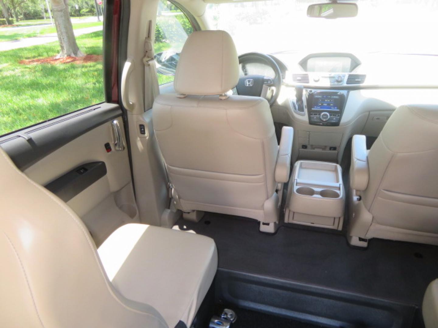 2016 Red /Beige Honda Odyssey EX-L (5FNRL5H62GB) with an 3.5L V6 SOHC 24V engine, 6A transmission, located at 4301 Oak Circle #19, Boca Raton, FL, 33431, (954) 561-2499, 26.388472, -80.084045 - 2016 Honda Odyssey EXL with Navigation with 29K Original Miles Braunability Handicap Wheelchair Conversion Van Rear Entry Conversion. Gorgeous Low Mileage Florida Van Fully Loaded With Every Option Including: Remote Keyless Entry, Push Button Start, Beautiful Beige Leather Interior, Tech Package, Na - Photo#54