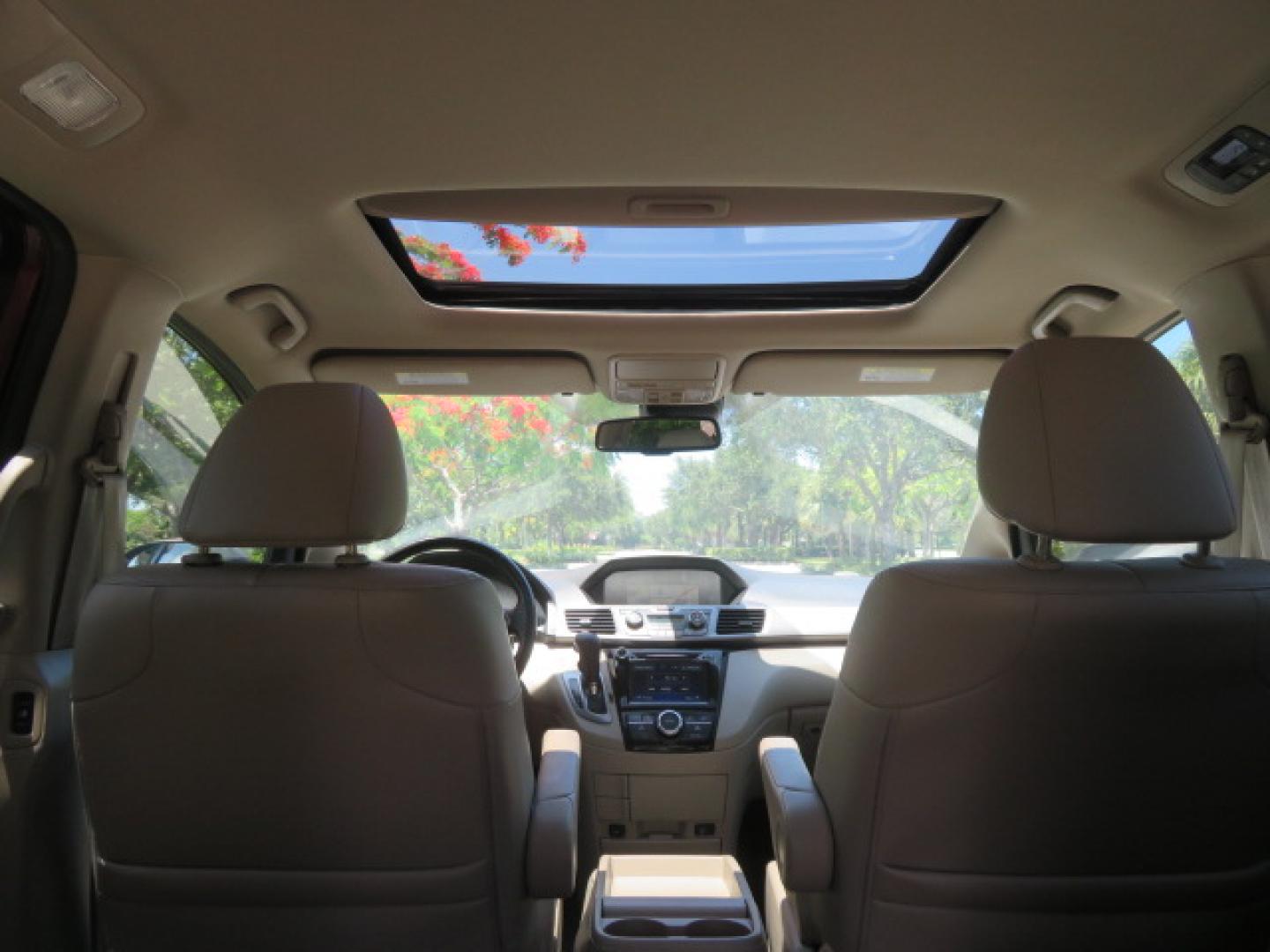 2016 Red /Beige Honda Odyssey EX-L (5FNRL5H62GB) with an 3.5L V6 SOHC 24V engine, 6A transmission, located at 4301 Oak Circle #19, Boca Raton, FL, 33431, (954) 561-2499, 26.388472, -80.084045 - 2016 Honda Odyssey EXL with Navigation with 29K Original Miles Braunability Handicap Wheelchair Conversion Van Rear Entry Conversion. Gorgeous Low Mileage Florida Van Fully Loaded With Every Option Including: Remote Keyless Entry, Push Button Start, Beautiful Beige Leather Interior, Tech Package, Na - Photo#72