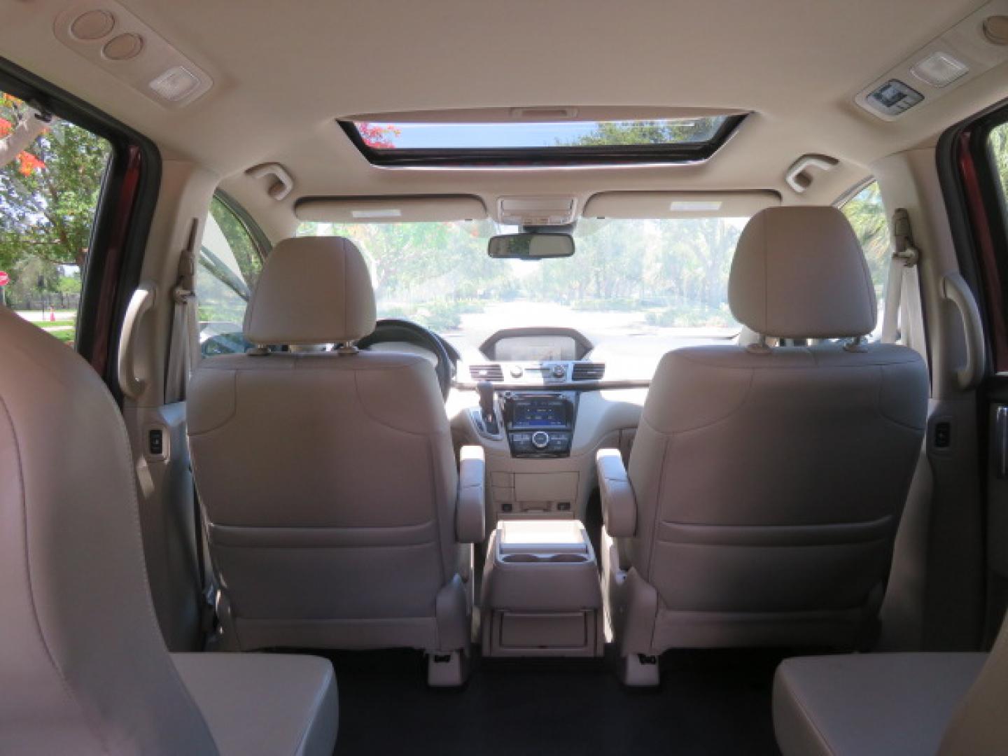 2016 Red /Beige Honda Odyssey EX-L (5FNRL5H62GB) with an 3.5L V6 SOHC 24V engine, 6A transmission, located at 4301 Oak Circle #19, Boca Raton, FL, 33431, (954) 561-2499, 26.388472, -80.084045 - 2016 Honda Odyssey EXL with Navigation with 29K Original Miles Braunability Handicap Wheelchair Conversion Van Rear Entry Conversion. Gorgeous Low Mileage Florida Van Fully Loaded With Every Option Including: Remote Keyless Entry, Push Button Start, Beautiful Beige Leather Interior, Tech Package, Na - Photo#7