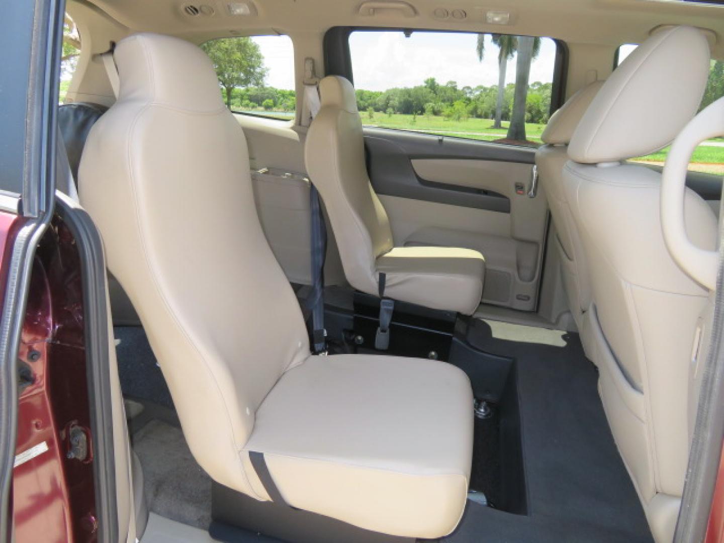 2016 Red /Beige Honda Odyssey EX-L (5FNRL5H62GB) with an 3.5L V6 SOHC 24V engine, 6A transmission, located at 4301 Oak Circle #19, Boca Raton, FL, 33431, (954) 561-2499, 26.388472, -80.084045 - 2016 Honda Odyssey EXL with Navigation with 29K Original Miles Braunability Handicap Wheelchair Conversion Van Rear Entry Conversion. Gorgeous Low Mileage Florida Van Fully Loaded With Every Option Including: Remote Keyless Entry, Push Button Start, Beautiful Beige Leather Interior, Tech Package, Na - Photo#73