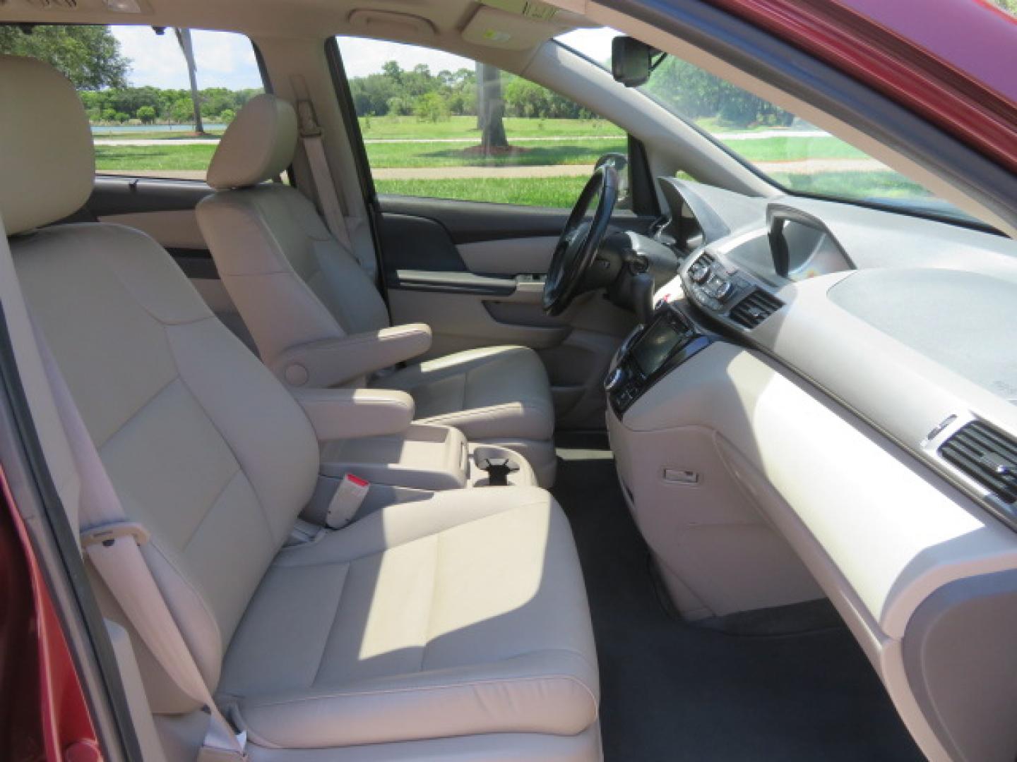 2016 Red /Beige Honda Odyssey EX-L (5FNRL5H62GB) with an 3.5L V6 SOHC 24V engine, 6A transmission, located at 4301 Oak Circle #19, Boca Raton, FL, 33431, (954) 561-2499, 26.388472, -80.084045 - 2016 Honda Odyssey EXL with Navigation with 29K Original Miles Braunability Handicap Wheelchair Conversion Van Rear Entry Conversion. Gorgeous Low Mileage Florida Van Fully Loaded With Every Option Including: Remote Keyless Entry, Push Button Start, Beautiful Beige Leather Interior, Tech Package, Na - Photo#76