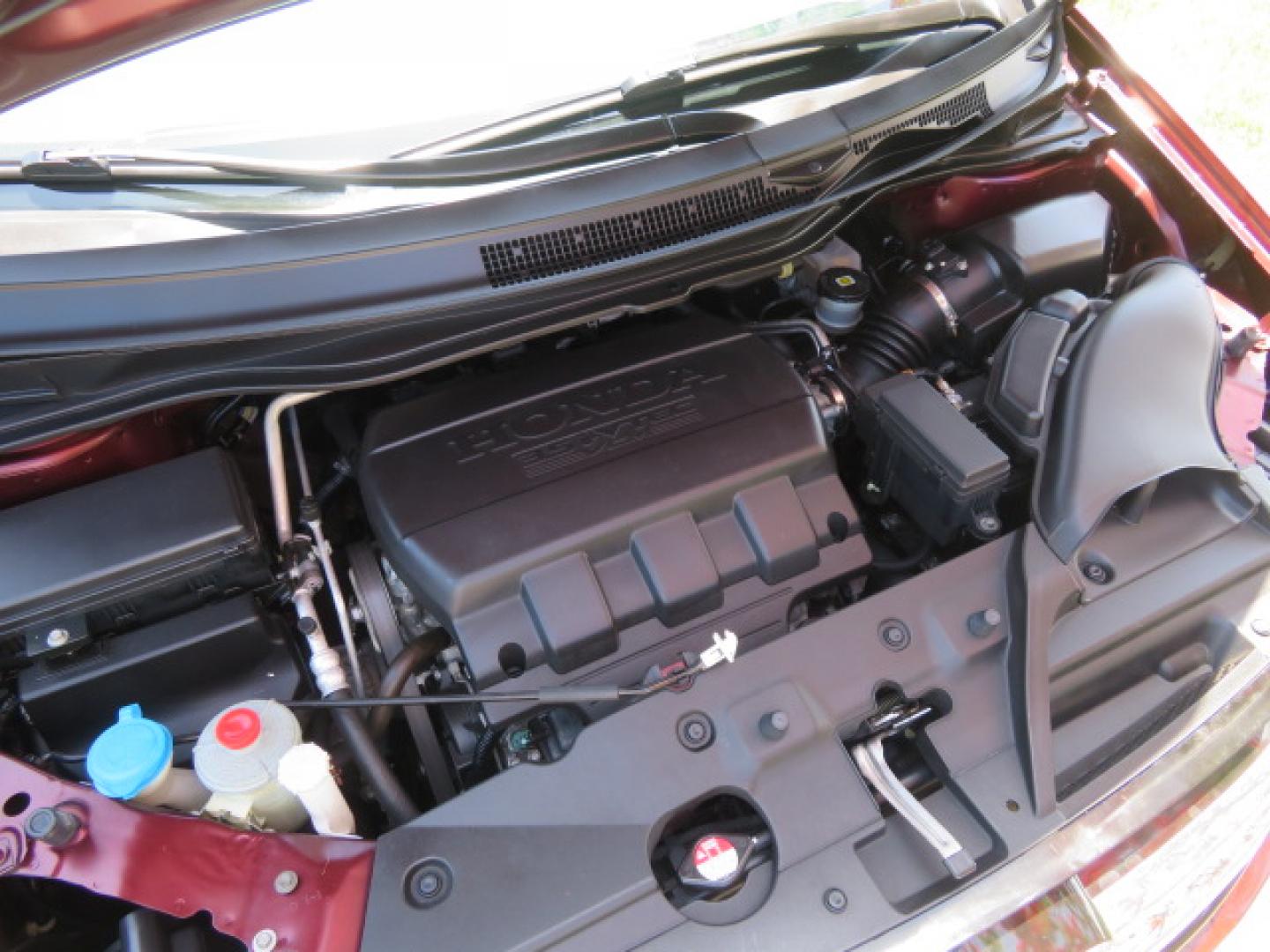 2016 Red /Beige Honda Odyssey EX-L (5FNRL5H62GB) with an 3.5L V6 SOHC 24V engine, 6A transmission, located at 4301 Oak Circle #19, Boca Raton, FL, 33431, (954) 561-2499, 26.388472, -80.084045 - 2016 Honda Odyssey EXL with Navigation with 29K Original Miles Braunability Handicap Wheelchair Conversion Van Rear Entry Conversion. Gorgeous Low Mileage Florida Van Fully Loaded With Every Option Including: Remote Keyless Entry, Push Button Start, Beautiful Beige Leather Interior, Tech Package, Na - Photo#87