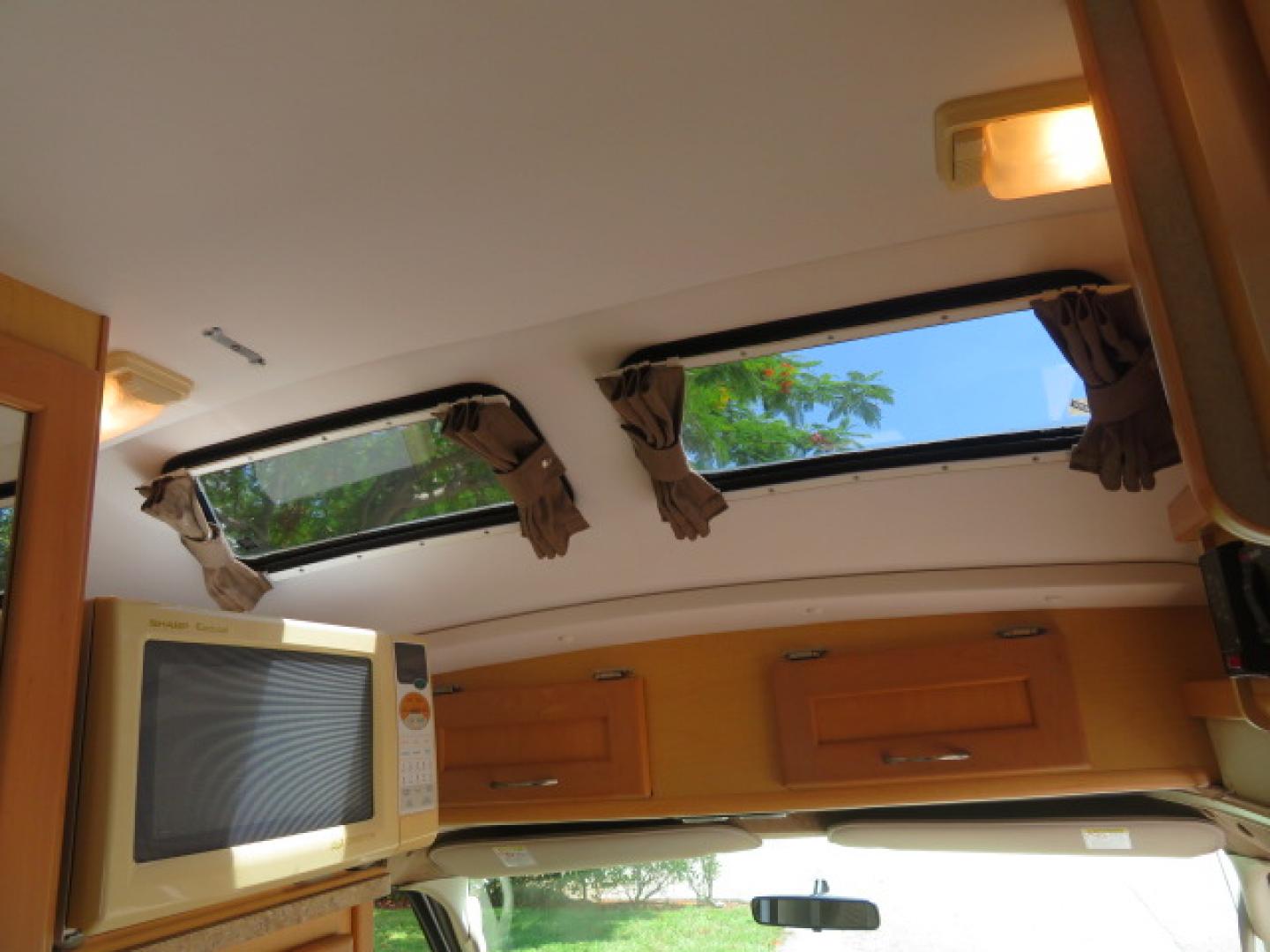 2006 White /Tan Ford Econoline E-350 Super Duty (1FDSE34L56H) with an 5.4L V8 SOHC 16V engine, located at 4301 Oak Circle #19, Boca Raton, FL, 33431, (954) 561-2499, 26.388472, -80.084045 - You are looking at Nicest 2006 Ford E350 Super Duty Pleasure Way Excel TS 5.4L V8 with Ultra Low 46K Original Miles Fully Loaded Class B RV. High End Quality with everything you need to go off grid today. This is a One Owner Rust Free Southern Van with a Clean Carfax and Clean Title. This Pleasure W - Photo#93