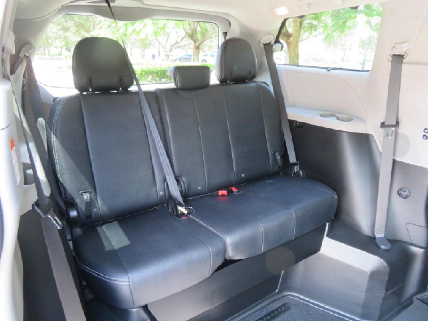 2017 White /Black Toyota Sienna SE 8-Passenger (5TDXZ3DC3HS) with an 3.5L V6 EFI DOHC 24V engine, 8A transmission, located at 4301 Oak Circle #19, Boca Raton, FL, 33431, (954) 561-2499, 26.388472, -80.084045 - You are looking at Gorgeous Low Mileage 2017 Toyota Sienna SE Sport Handicap Van Wheelchair Van VMI Conversion Van with 42K Original Miles, Power Side Entry Ramp with Kneeling Van Function, Q Straint Tie Down System. Quick Release Front Seats, Floor with L Tracks, Black Leather Interior, Premium Sou - Photo#45