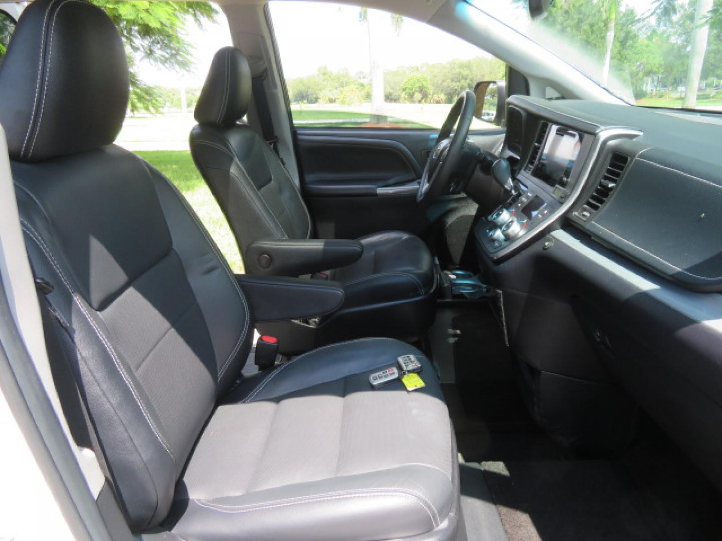 2017 White /Black Toyota Sienna SE 8-Passenger (5TDXZ3DC3HS) with an 3.5L V6 EFI DOHC 24V engine, 8A transmission, located at 4301 Oak Circle #19, Boca Raton, FL, 33431, (954) 561-2499, 26.388472, -80.084045 - You are looking at Gorgeous Low Mileage 2017 Toyota Sienna SE Sport Handicap Van Wheelchair Van VMI Conversion Van with 42K Original Miles, Power Side Entry Ramp with Kneeling Van Function, Q Straint Tie Down System. Quick Release Front Seats, Floor with L Tracks, Black Leather Interior, Premium Sou - Photo#74