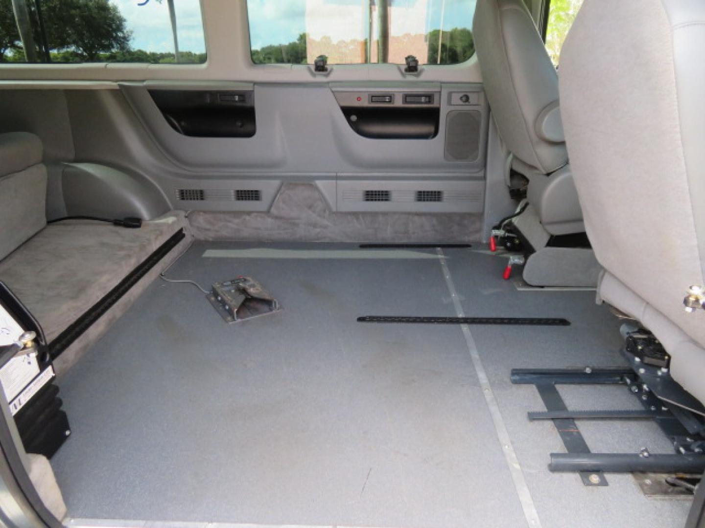 2013 Ford E-Series Wagon E-150 XLT (1FMNE1BL5DD) with an 5.4L V8 SOHC 16V FFV engine, 4-Speed Automatic transmission, located at 4301 Oak Circle #19, Boca Raton, FL, 33431, (954) 561-2499, 26.388472, -80.084045 - You are looking at a Stunning 2013 Ford Econoline XLT NorCal Plus Handicap Wheelchair Conversion Van with 42K Original Miles, 6 Inch Fully Lowered Floor, Remote Control Power Side Entry Doors, In Floor Tie Down System, Quick Release Front Seat, Braun UVL Power Side Entry Wheelchair Lift, EZ Lock, Pa - Photo#52