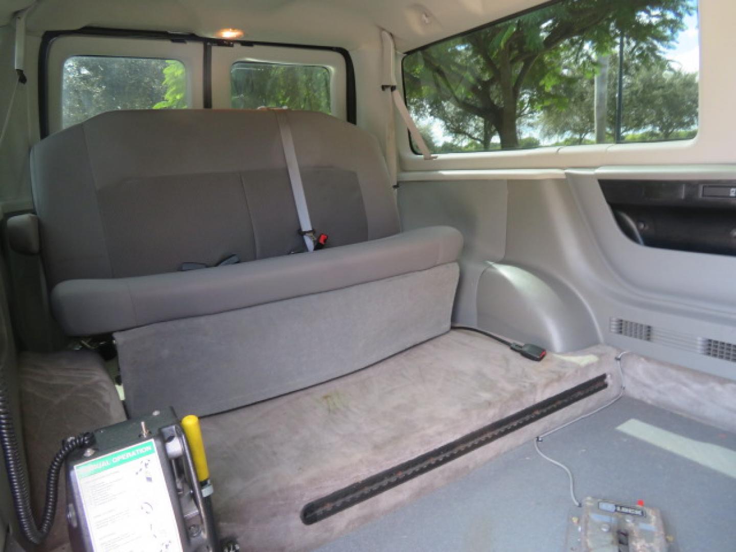 2013 Ford E-Series Wagon E-150 XLT (1FMNE1BL5DD) with an 5.4L V8 SOHC 16V FFV engine, 4-Speed Automatic transmission, located at 4301 Oak Circle #19, Boca Raton, FL, 33431, (954) 561-2499, 26.388472, -80.084045 - You are looking at a Stunning 2013 Ford Econoline XLT NorCal Plus Handicap Wheelchair Conversion Van with 42K Original Miles, 6 Inch Fully Lowered Floor, Remote Control Power Side Entry Doors, In Floor Tie Down System, Quick Release Front Seat, Braun UVL Power Side Entry Wheelchair Lift, EZ Lock, Pa - Photo#53