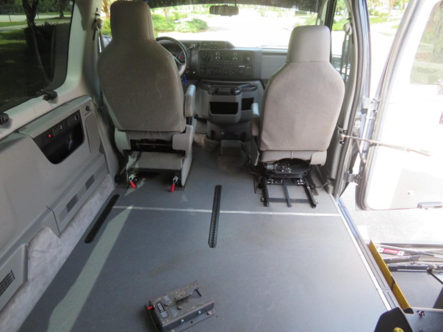 2013 Ford E-Series Wagon E-150 XLT (1FMNE1BL5DD) with an 5.4L V8 SOHC 16V FFV engine, 4-Speed Automatic transmission, located at 4301 Oak Circle #19, Boca Raton, FL, 33431, (954) 561-2499, 26.388472, -80.084045 - You are looking at a Stunning 2013 Ford Econoline XLT NorCal Plus Handicap Wheelchair Conversion Van with 42K Original Miles, 6 Inch Fully Lowered Floor, Remote Control Power Side Entry Doors, In Floor Tie Down System, Quick Release Front Seat, Braun UVL Power Side Entry Wheelchair Lift, EZ Lock, Pa - Photo#57