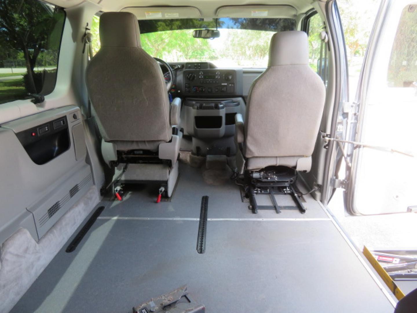 2013 Ford E-Series Wagon E-150 XLT (1FMNE1BL5DD) with an 5.4L V8 SOHC 16V FFV engine, 4-Speed Automatic transmission, located at 4301 Oak Circle #19, Boca Raton, FL, 33431, (954) 561-2499, 26.388472, -80.084045 - You are looking at a Stunning 2013 Ford Econoline XLT NorCal Plus Handicap Wheelchair Conversion Van with 42K Original Miles, 6 Inch Fully Lowered Floor, Remote Control Power Side Entry Doors, In Floor Tie Down System, Quick Release Front Seat, Braun UVL Power Side Entry Wheelchair Lift, EZ Lock, Pa - Photo#58