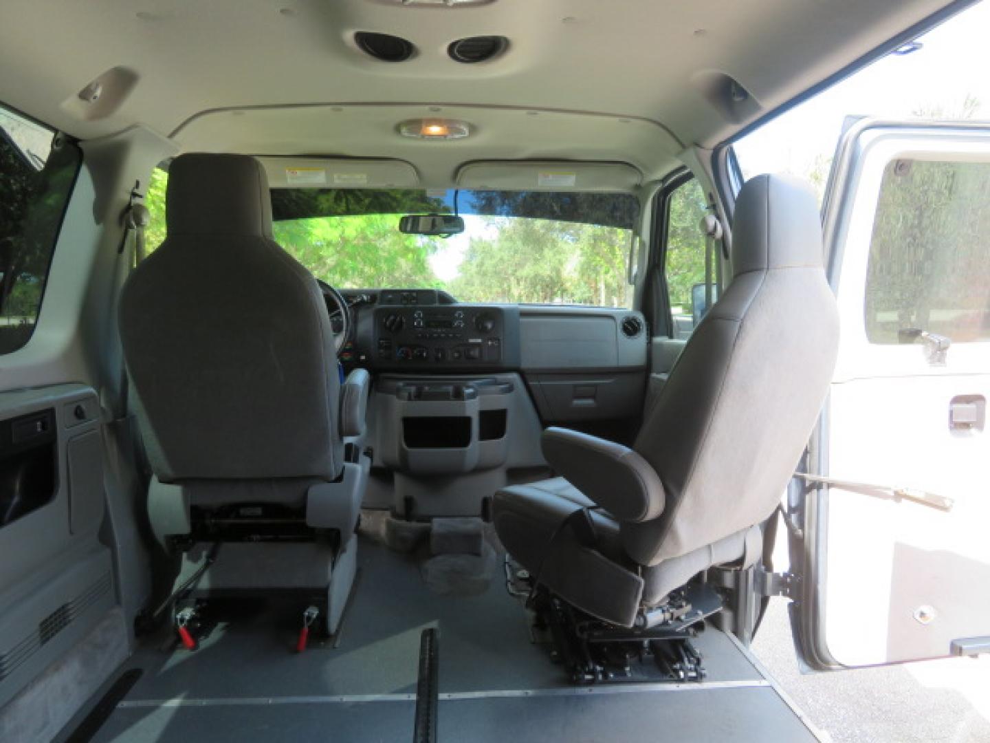 2013 Ford E-Series Wagon E-150 XLT (1FMNE1BL5DD) with an 5.4L V8 SOHC 16V FFV engine, 4-Speed Automatic transmission, located at 4301 Oak Circle #19, Boca Raton, FL, 33431, (954) 561-2499, 26.388472, -80.084045 - You are looking at a Stunning 2013 Ford Econoline XLT NorCal Plus Handicap Wheelchair Conversion Van with 42K Original Miles, 6 Inch Fully Lowered Floor, Remote Control Power Side Entry Doors, In Floor Tie Down System, Quick Release Front Seat, Braun UVL Power Side Entry Wheelchair Lift, EZ Lock, Pa - Photo#59