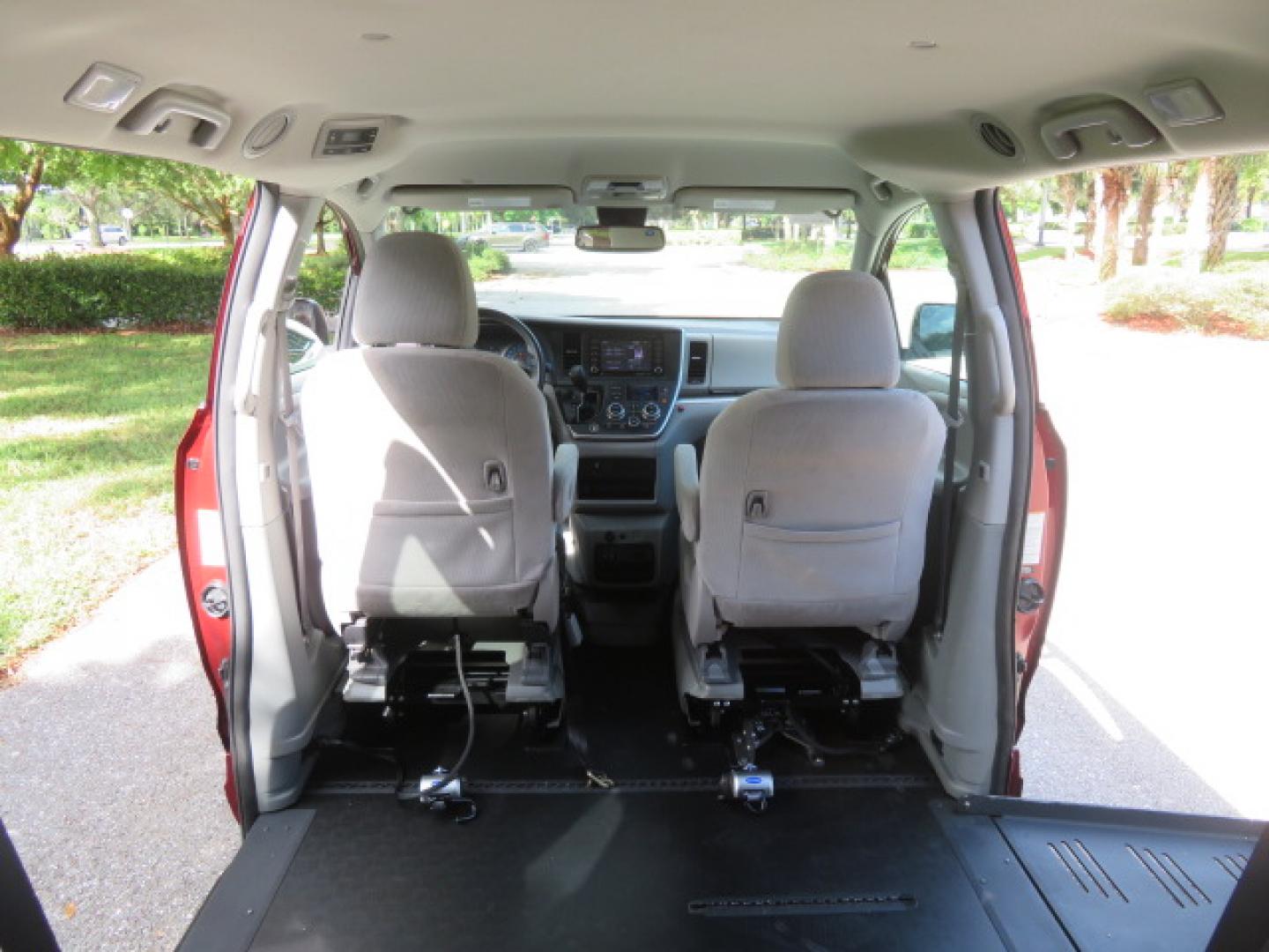 2020 Red /Gray Toyota Sienna LE 8-Passenger (5TDKZ3DC9LS) with an 3.5L V6 EFI DOHC 24V engine, 8A transmission, located at 4301 Oak Circle #19, Boca Raton, FL, 33431, (954) 561-2499, 26.388472, -80.084045 - Photo#66