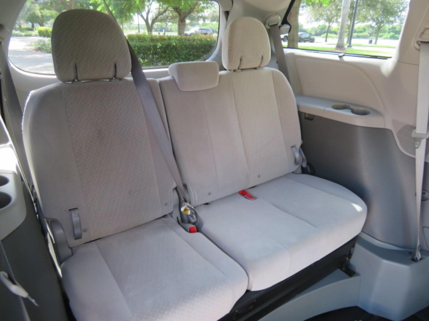 2020 Red /Gray Toyota Sienna LE 8-Passenger (5TDKZ3DC9LS) with an 3.5L V6 EFI DOHC 24V engine, 8A transmission, located at 4301 Oak Circle #19, Boca Raton, FL, 33431, (954) 561-2499, 26.388472, -80.084045 - Photo#42