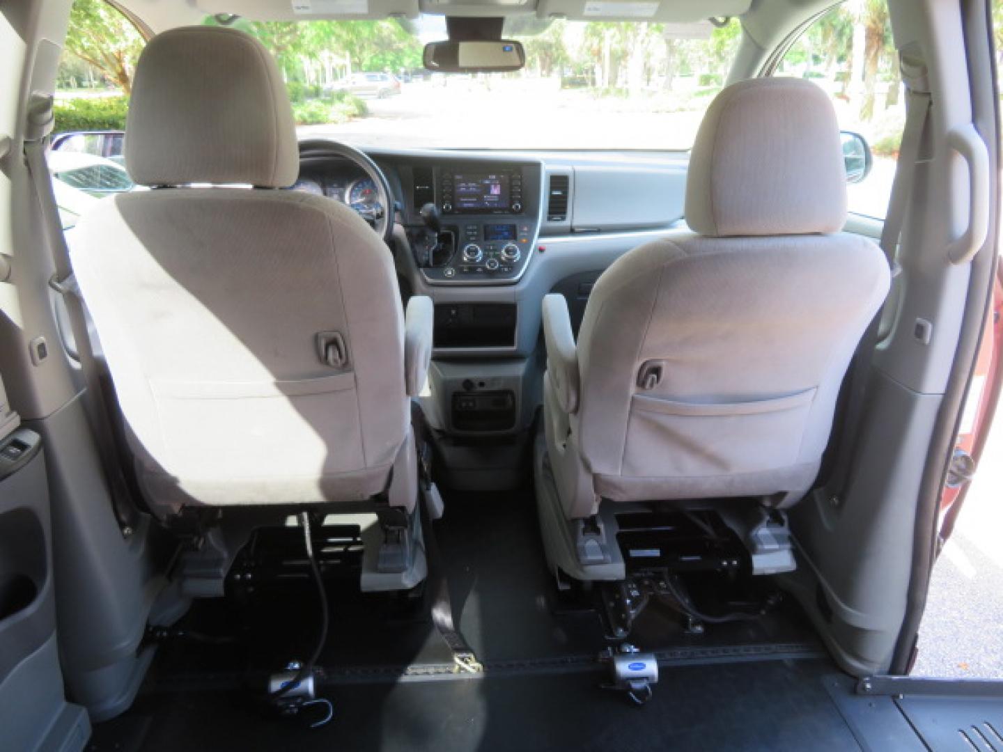 2020 Red /Gray Toyota Sienna LE 8-Passenger (5TDKZ3DC9LS) with an 3.5L V6 EFI DOHC 24V engine, 8A transmission, located at 4301 Oak Circle #19, Boca Raton, FL, 33431, (954) 561-2499, 26.388472, -80.084045 - Photo#46