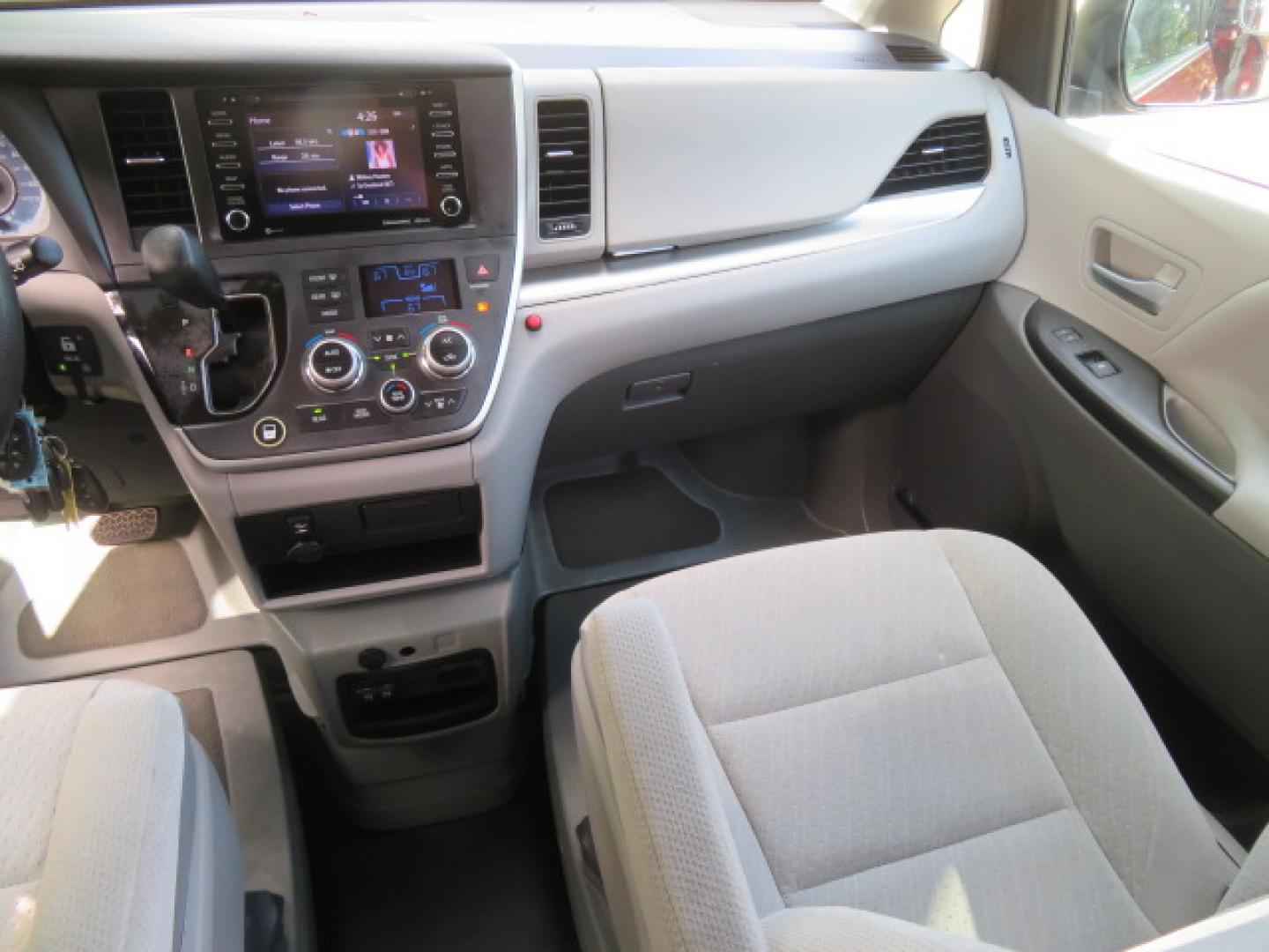 2020 Red /Gray Toyota Sienna LE 8-Passenger (5TDKZ3DC9LS) with an 3.5L V6 EFI DOHC 24V engine, 8A transmission, located at 4301 Oak Circle #19, Boca Raton, FL, 33431, (954) 561-2499, 26.388472, -80.084045 - Photo#49