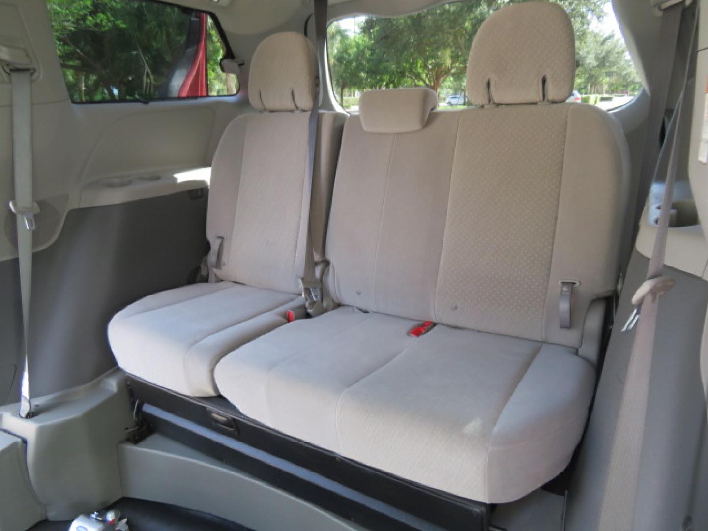2020 Red /Gray Toyota Sienna LE 8-Passenger (5TDKZ3DC9LS) with an 3.5L V6 EFI DOHC 24V engine, 8A transmission, located at 4301 Oak Circle #19, Boca Raton, FL, 33431, (954) 561-2499, 26.388472, -80.084045 - Photo#53