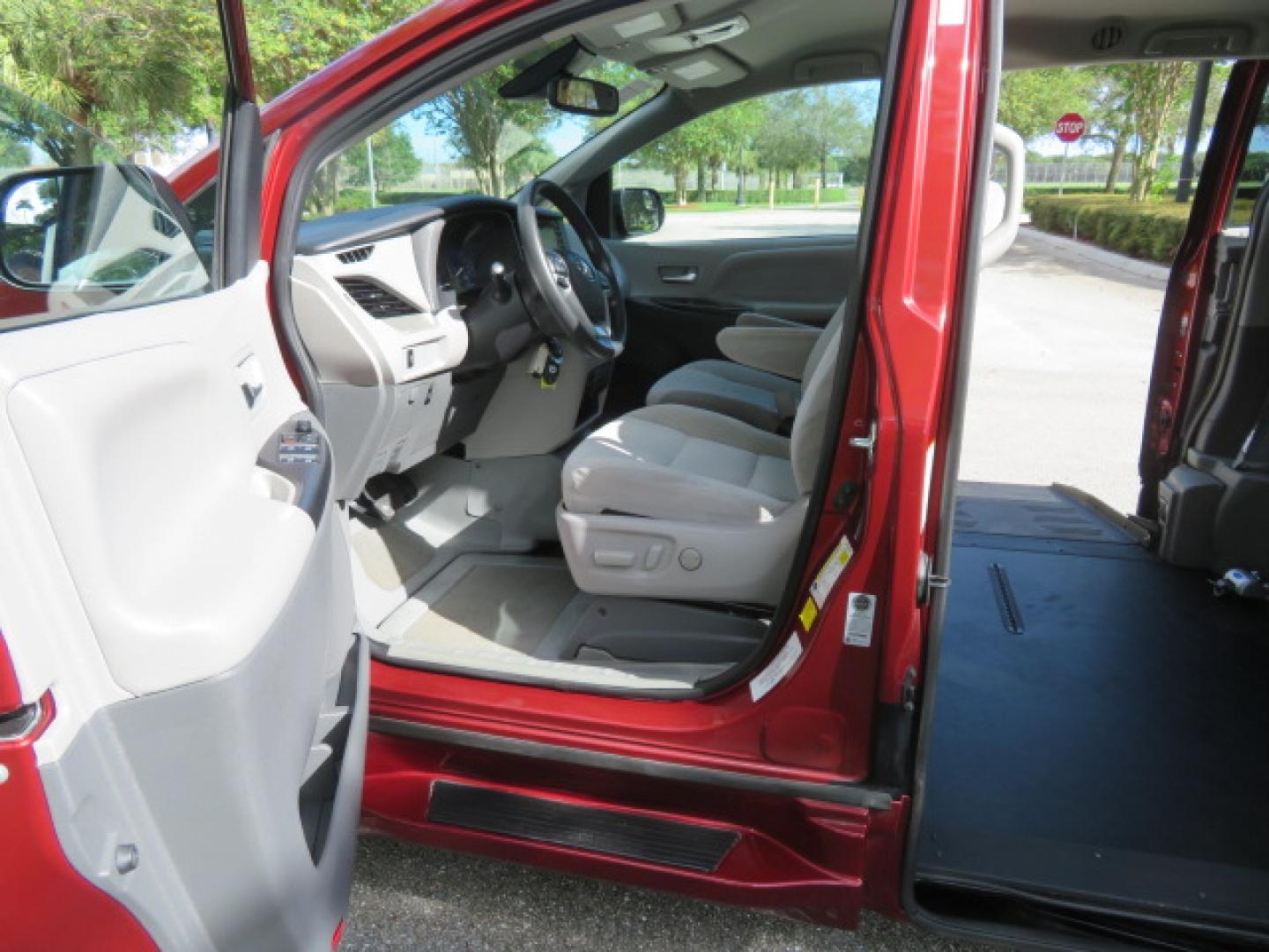 2020 Red /Gray Toyota Sienna LE 8-Passenger (5TDKZ3DC9LS) with an 3.5L V6 EFI DOHC 24V engine, 8A transmission, located at 4301 Oak Circle #19, Boca Raton, FL, 33431, (954) 561-2499, 26.388472, -80.084045 - Photo#54