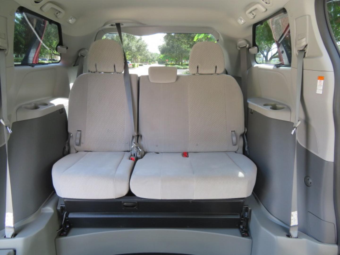 2020 Red /Gray Toyota Sienna LE 8-Passenger (5TDKZ3DC9LS) with an 3.5L V6 EFI DOHC 24V engine, 8A transmission, located at 4301 Oak Circle #19, Boca Raton, FL, 33431, (954) 561-2499, 26.388472, -80.084045 - Photo#62