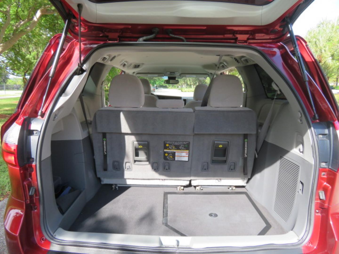 2020 Red /Gray Toyota Sienna LE 8-Passenger (5TDKZ3DC9LS) with an 3.5L V6 EFI DOHC 24V engine, 8A transmission, located at 4301 Oak Circle #19, Boca Raton, FL, 33431, (954) 561-2499, 26.388472, -80.084045 - Photo#63