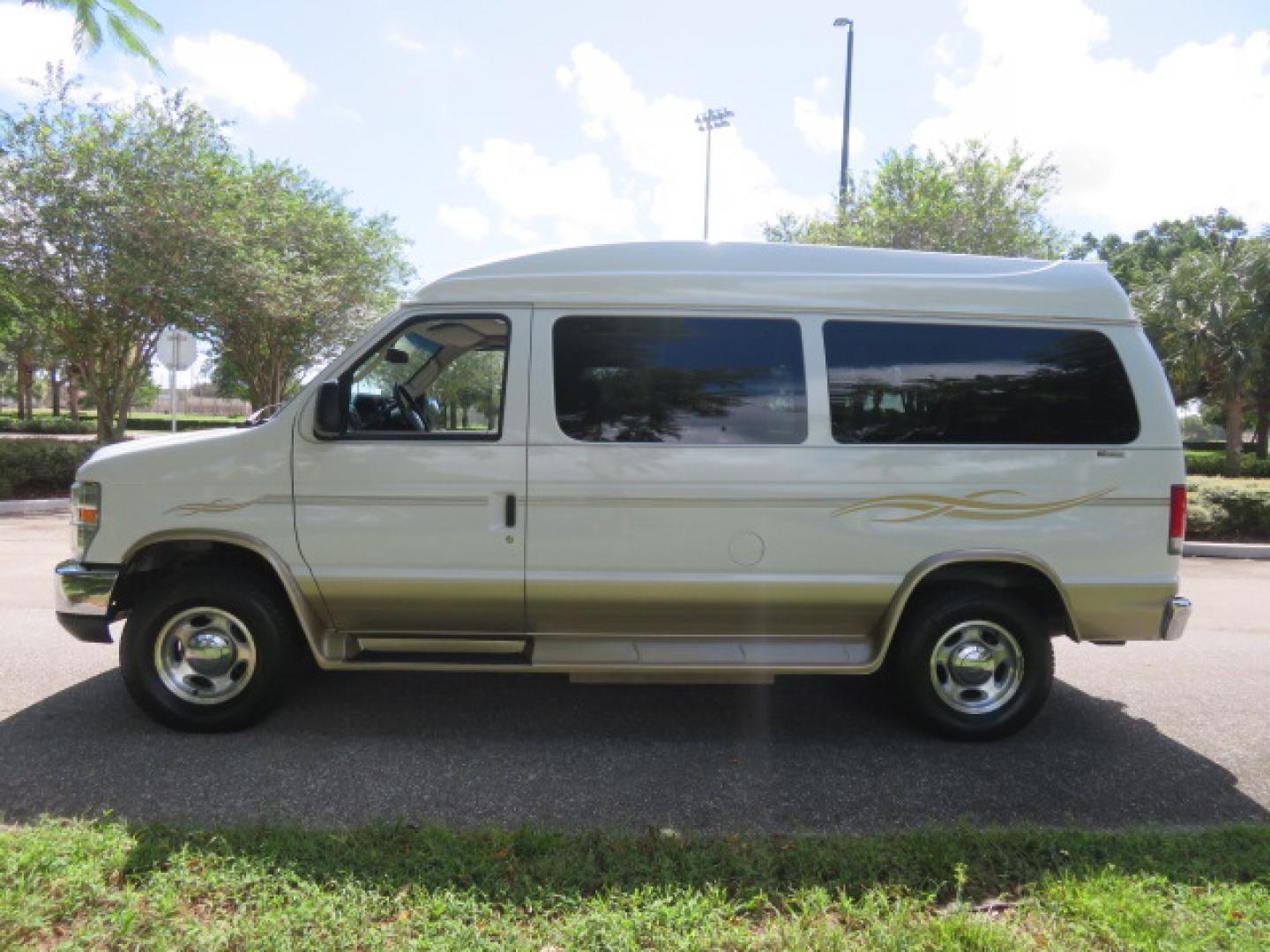2014 White /Tan Ford E-Series Van E-150 (1FTNE1EL8ED) with an 5.4L V8 SOHC 16V FFV engine, 4-Speed Automatic transmission, located at 4301 Oak Circle #19, Boca Raton, FL, 33431, (954) 561-2499, 26.388472, -80.084045 - 2014 Ford E-Series Van E-150 Handicap Wheelchair Conversion Van 38K Original Miles Gorgeous Power Doors Transfer Seat Braun UVL - Photo#11