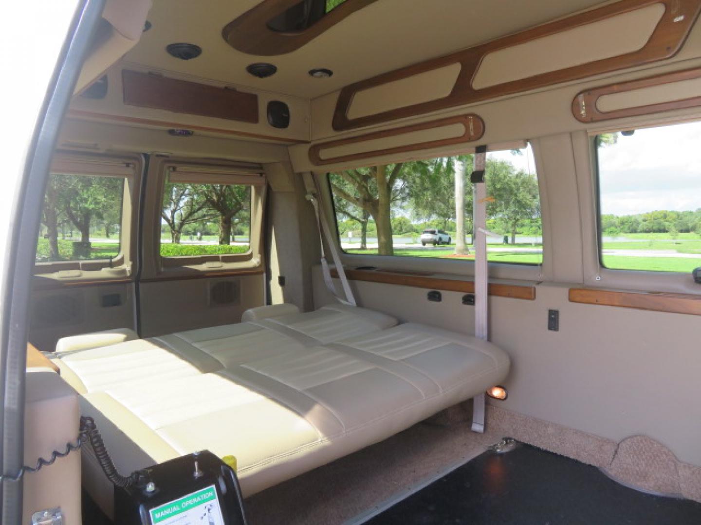 2014 White /Tan Ford E-Series Van E-150 (1FTNE1EL8ED) with an 5.4L V8 SOHC 16V FFV engine, 4-Speed Automatic transmission, located at 4301 Oak Circle #19, Boca Raton, FL, 33431, (954) 561-2499, 26.388472, -80.084045 - 2014 Ford E-Series Van E-150 Handicap Wheelchair Conversion Van 38K Original Miles Gorgeous Power Doors Transfer Seat Braun UVL - Photo#48