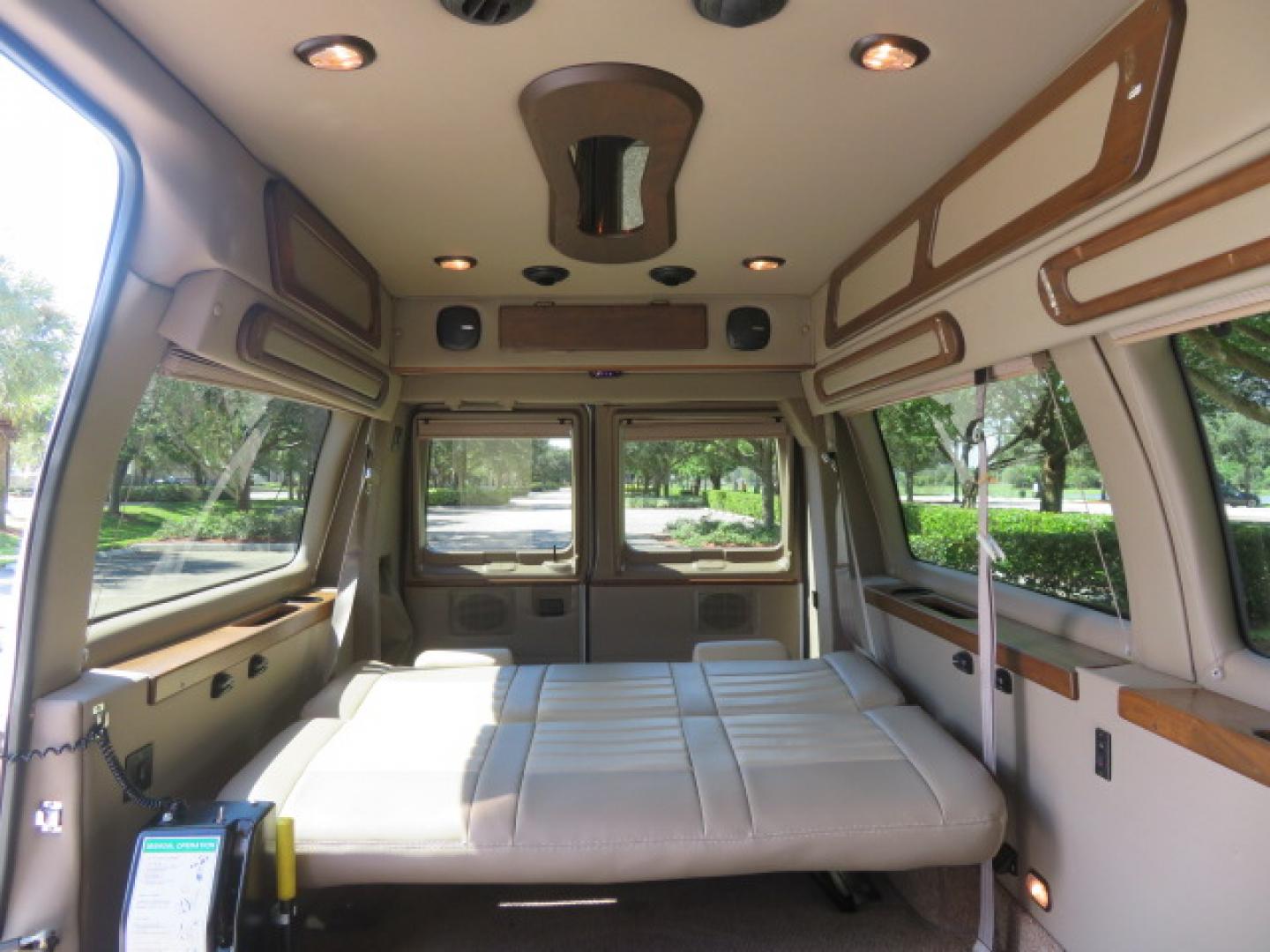 2014 White /Tan Ford E-Series Van E-150 (1FTNE1EL8ED) with an 5.4L V8 SOHC 16V FFV engine, 4-Speed Automatic transmission, located at 4301 Oak Circle #19, Boca Raton, FL, 33431, (954) 561-2499, 26.388472, -80.084045 - 2014 Ford E-Series Van E-150 Handicap Wheelchair Conversion Van 38K Original Miles Gorgeous Power Doors Transfer Seat Braun UVL - Photo#61