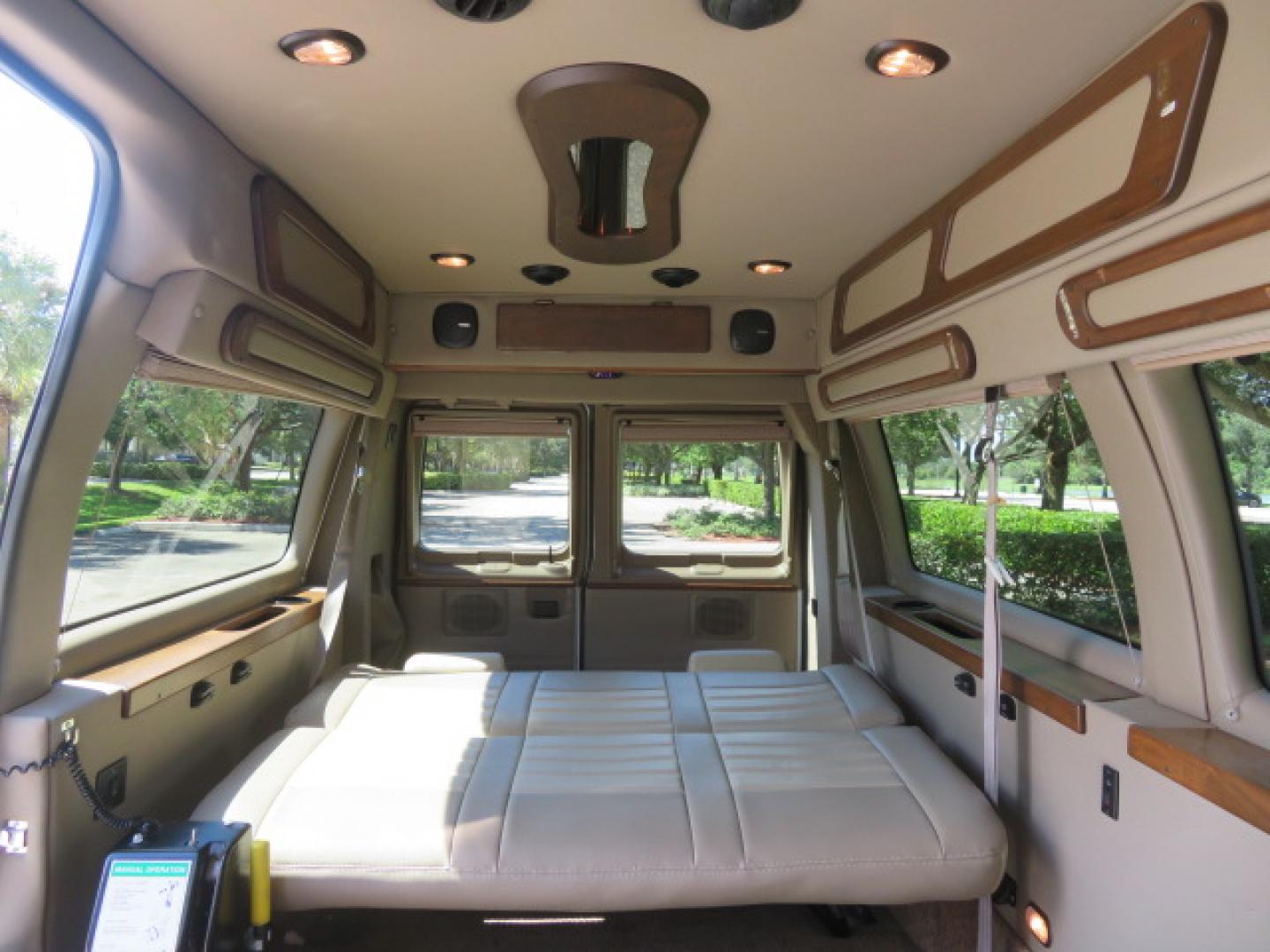 2014 White /Tan Ford E-Series Van E-150 (1FTNE1EL8ED) with an 5.4L V8 SOHC 16V FFV engine, 4-Speed Automatic transmission, located at 4301 Oak Circle #19, Boca Raton, FL, 33431, (954) 561-2499, 26.388472, -80.084045 - 2014 Ford E-Series Van E-150 Handicap Wheelchair Conversion Van 38K Original Miles Gorgeous Power Doors Transfer Seat Braun UVL - Photo#62