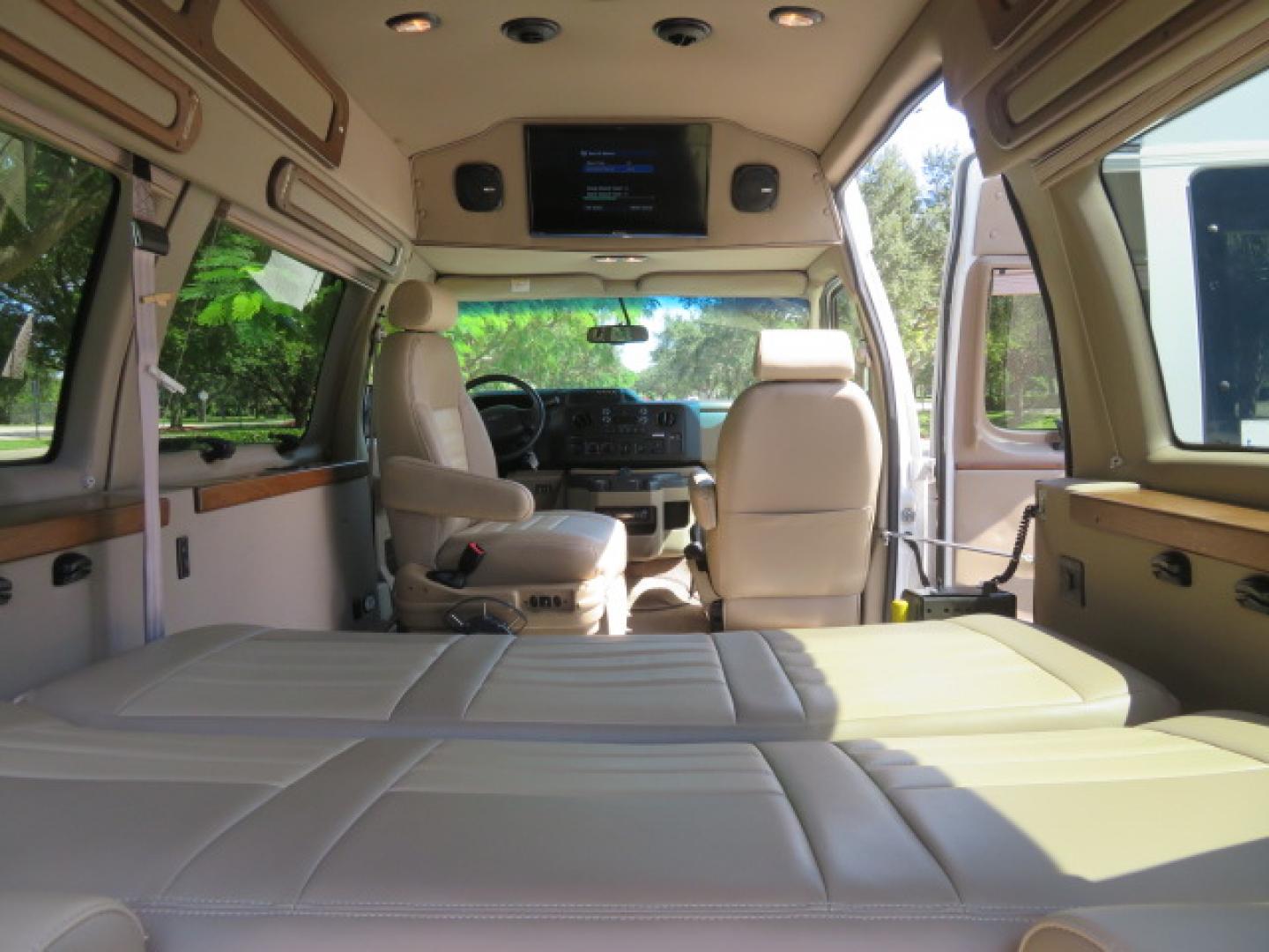 2014 White /Tan Ford E-Series Van E-150 (1FTNE1EL8ED) with an 5.4L V8 SOHC 16V FFV engine, 4-Speed Automatic transmission, located at 4301 Oak Circle #19, Boca Raton, FL, 33431, (954) 561-2499, 26.388472, -80.084045 - 2014 Ford E-Series Van E-150 Handicap Wheelchair Conversion Van 38K Original Miles Gorgeous Power Doors Transfer Seat Braun UVL - Photo#78