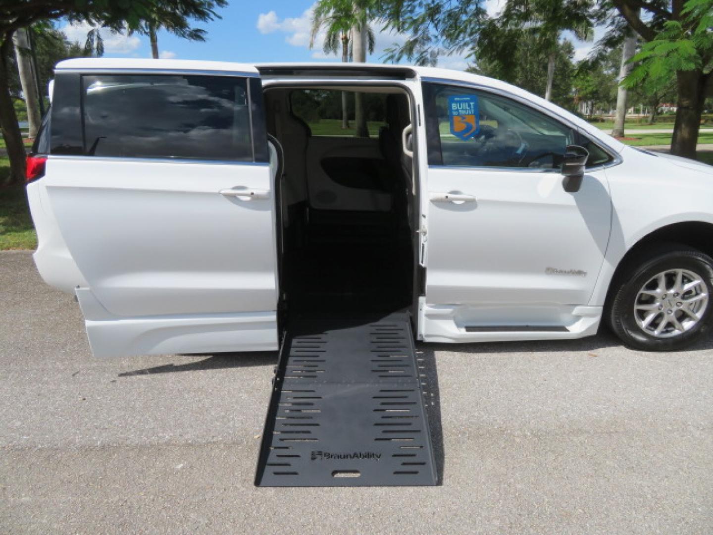 2024 White /Black Chrysler Pacifica Touring L (2C4RC1BG3RR) with an 3.6L V6 DOHC 24V engine, 9A transmission, located at 4301 Oak Circle #19, Boca Raton, FL, 33431, (954) 561-2499, 26.388472, -80.084045 - Certified Pre-Owned BraunAbility Chrysler Pacifica - Backed by a 7-Year/100K Mile Warranty! Experience the road with unmatched independence in this beautifully maintained, white Chrysler Pacifica minivan, professionally converted by BraunAbility. This vehicle isn't just pre-owned—it's Certified - Photo#33