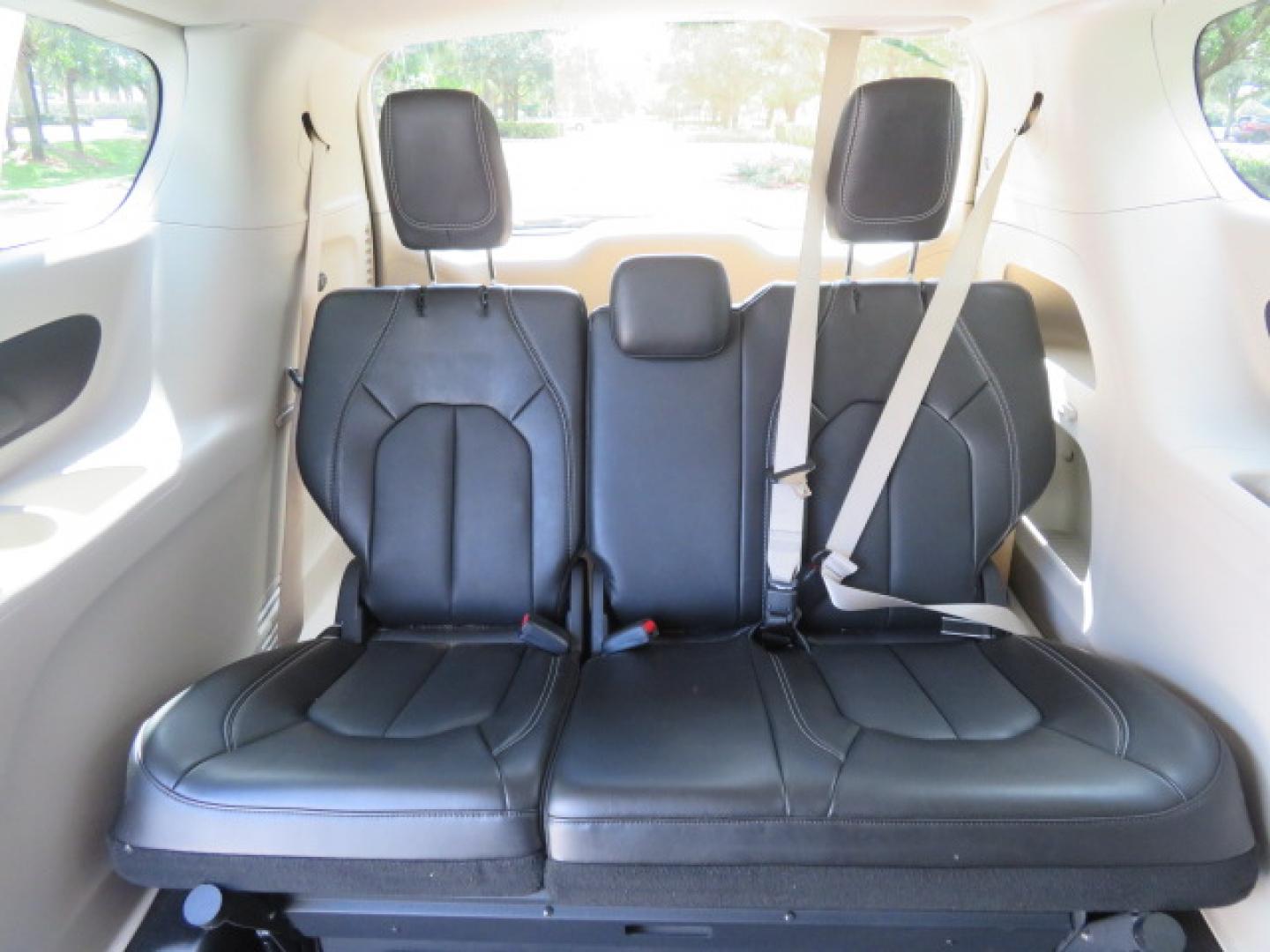 2024 White /Black Chrysler Pacifica Touring L (2C4RC1BG3RR) with an 3.6L V6 DOHC 24V engine, 9A transmission, located at 4301 Oak Circle #19, Boca Raton, FL, 33431, (954) 561-2499, 26.388472, -80.084045 - Certified Pre-Owned BraunAbility Chrysler Pacifica - Backed by a 7-Year/100K Mile Warranty! Experience the road with unmatched independence in this beautifully maintained, white Chrysler Pacifica minivan, professionally converted by BraunAbility. This vehicle isn't just pre-owned—it's Certified - Photo#35