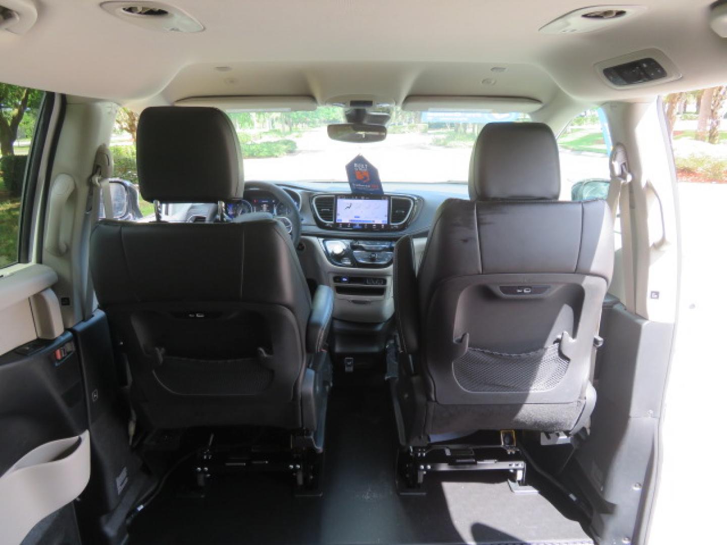 2024 White /Black Chrysler Pacifica Touring L (2C4RC1BG3RR) with an 3.6L V6 DOHC 24V engine, 9A transmission, located at 4301 Oak Circle #19, Boca Raton, FL, 33431, (954) 561-2499, 26.388472, -80.084045 - Certified Pre-Owned BraunAbility Chrysler Pacifica - Backed by a 7-Year/100K Mile Warranty! Experience the road with unmatched independence in this beautifully maintained, white Chrysler Pacifica minivan, professionally converted by BraunAbility. This vehicle isn't just pre-owned—it's Certified - Photo#38