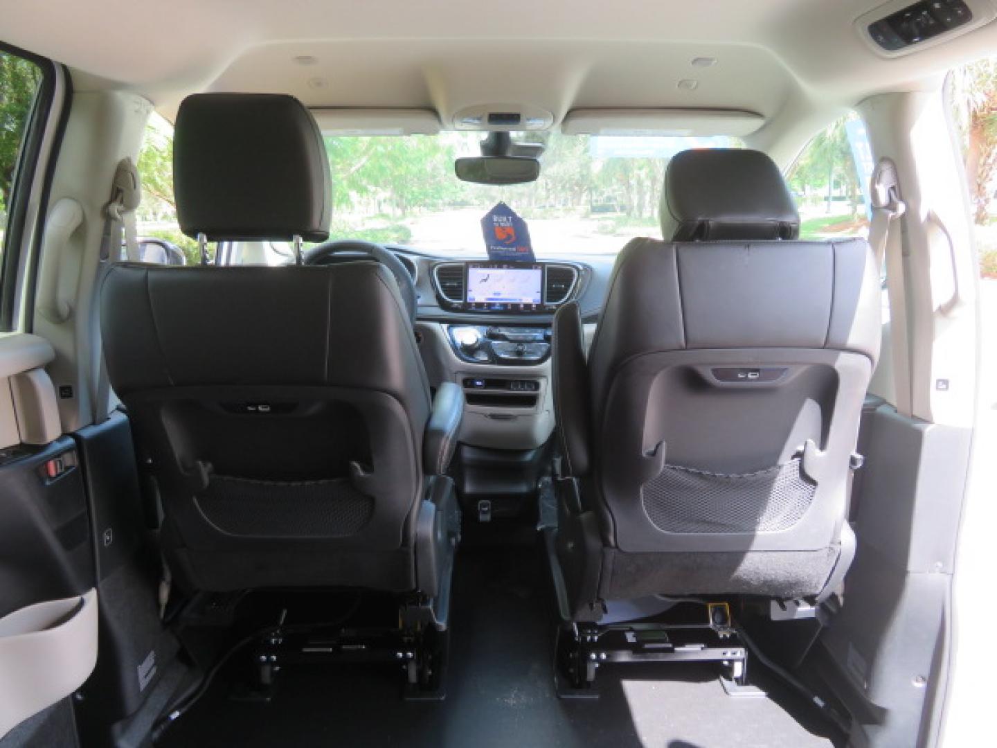 2024 White /Black Chrysler Pacifica Touring L (2C4RC1BG3RR) with an 3.6L V6 DOHC 24V engine, 9A transmission, located at 4301 Oak Circle #19, Boca Raton, FL, 33431, (954) 561-2499, 26.388472, -80.084045 - Certified Pre-Owned BraunAbility Chrysler Pacifica - Backed by a 7-Year/100K Mile Warranty! Experience the road with unmatched independence in this beautifully maintained, white Chrysler Pacifica minivan, professionally converted by BraunAbility. This vehicle isn't just pre-owned—it's Certified - Photo#36