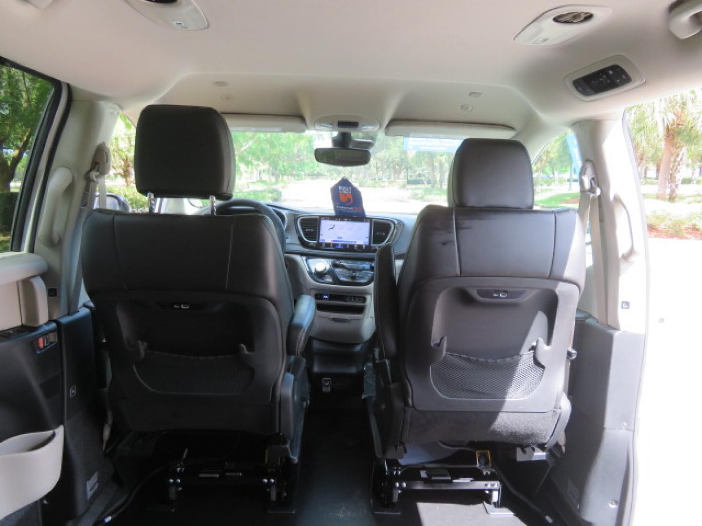 2024 White /Black Chrysler Pacifica Touring L (2C4RC1BG3RR) with an 3.6L V6 DOHC 24V engine, 9A transmission, located at 4301 Oak Circle #19, Boca Raton, FL, 33431, (954) 561-2499, 26.388472, -80.084045 - Certified Pre-Owned BraunAbility Chrysler Pacifica - Backed by a 7-Year/100K Mile Warranty! Experience the road with unmatched independence in this beautifully maintained, white Chrysler Pacifica minivan, professionally converted by BraunAbility. This vehicle isn't just pre-owned—it's Certified - Photo#37