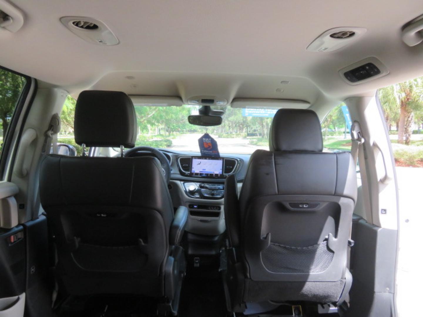 2024 White /Black Chrysler Pacifica Touring L (2C4RC1BG3RR) with an 3.6L V6 DOHC 24V engine, 9A transmission, located at 4301 Oak Circle #19, Boca Raton, FL, 33431, (954) 561-2499, 26.388472, -80.084045 - Certified Pre-Owned BraunAbility Chrysler Pacifica - Backed by a 7-Year/100K Mile Warranty! Experience the road with unmatched independence in this beautifully maintained, white Chrysler Pacifica minivan, professionally converted by BraunAbility. This vehicle isn't just pre-owned—it's Certified - Photo#40